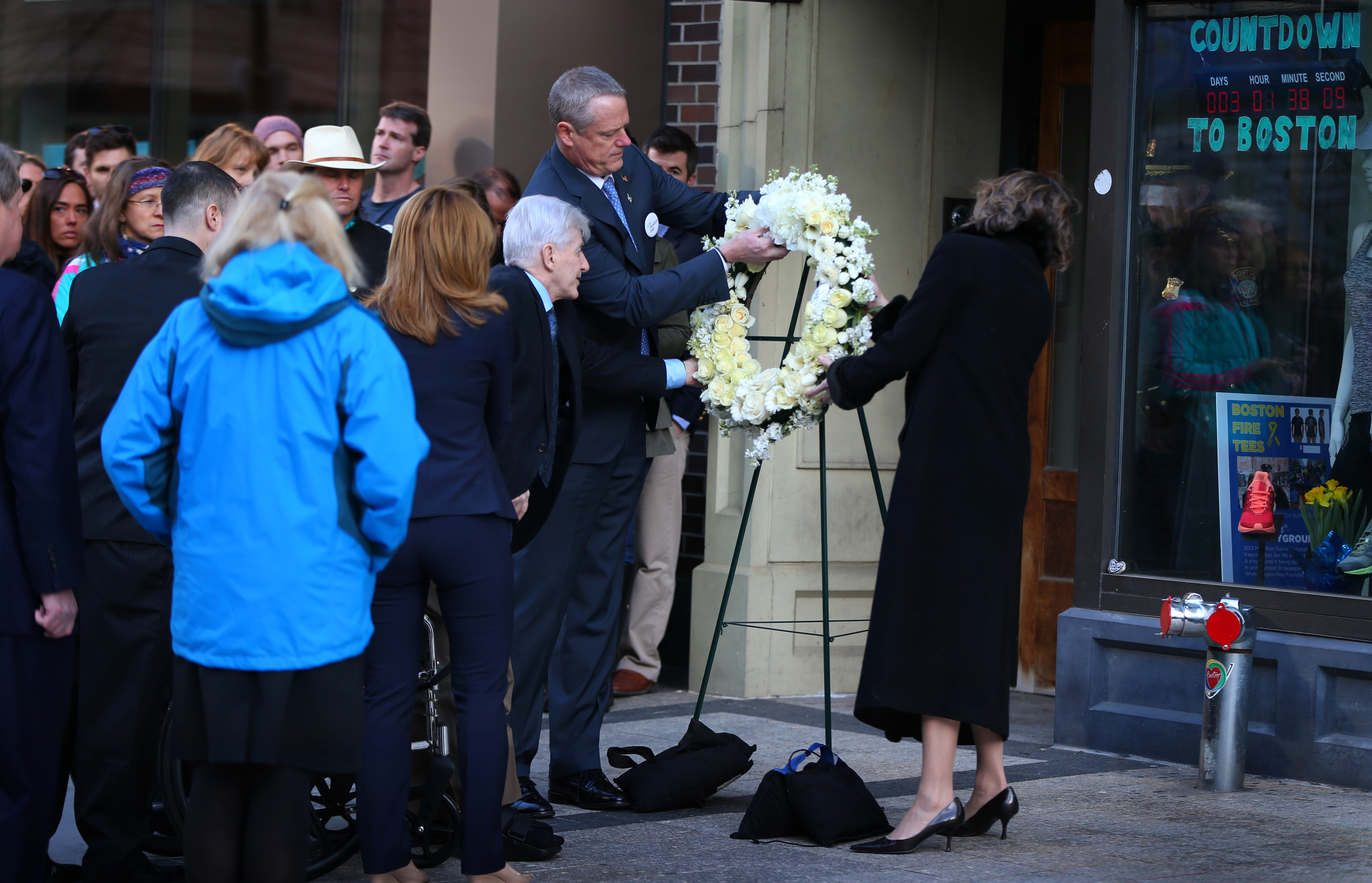 Governor Charlie Baker and his wife participated in a wreath-laying ceremony on Boylston Street with members of Krystle Campbell’s family. Campbell was 29 when she was killed in the 2013 Boston Marathon bombings.