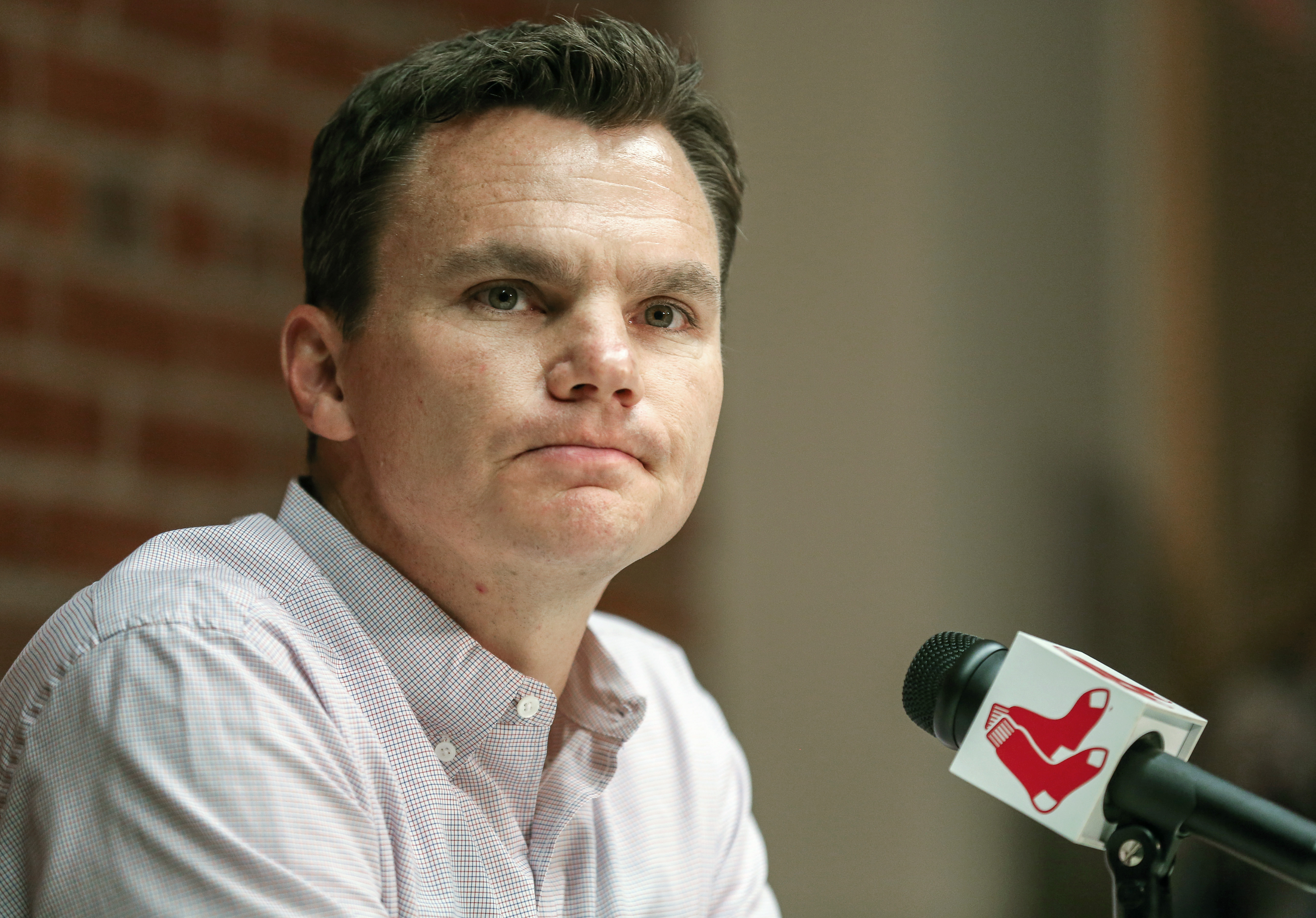 ‘‘It was a difficult thing to do to trade away four players like this,” Red Sox general manager Ben Cherington said Saturday.