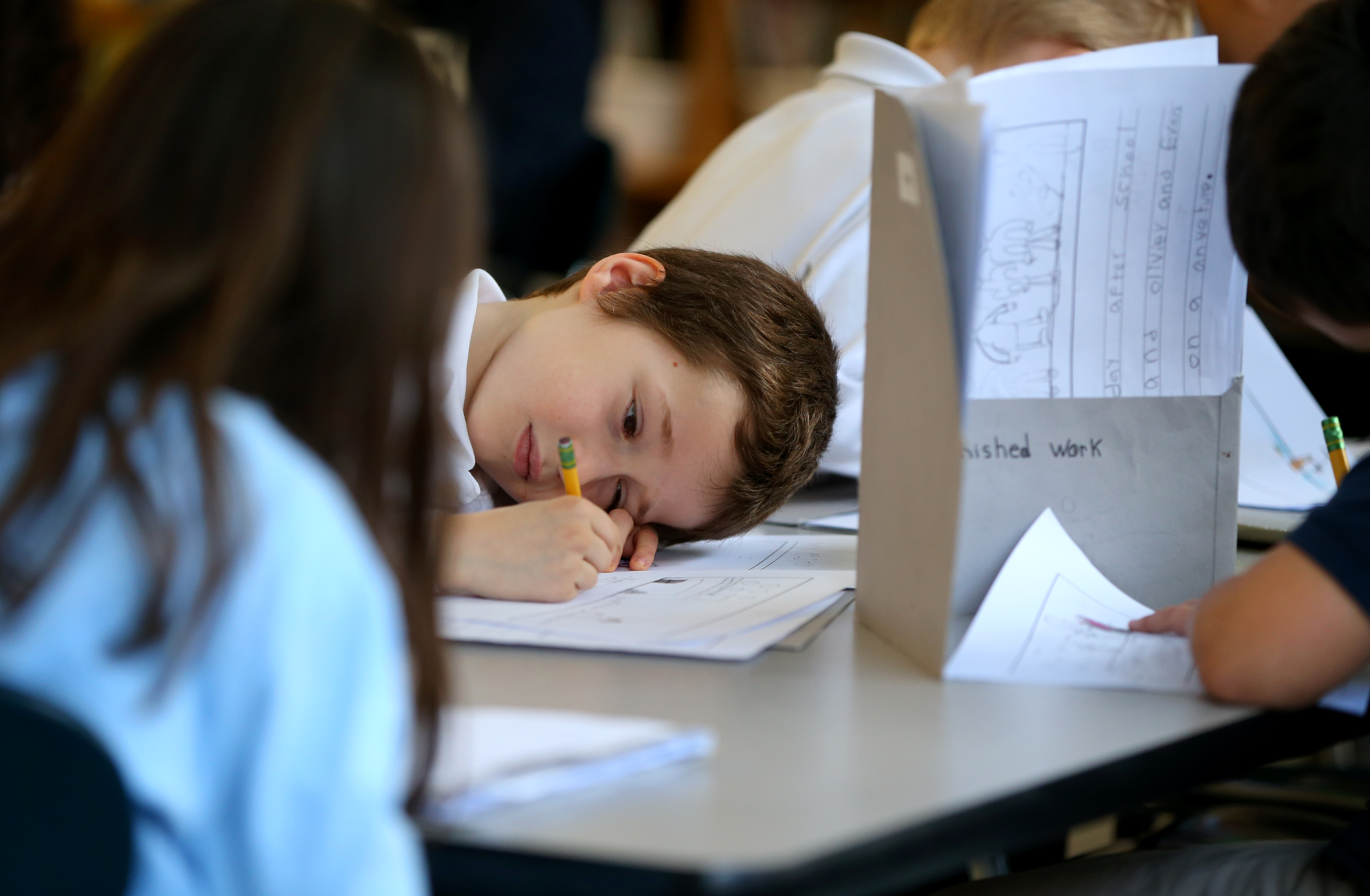 First-grader Ezra Devonshire in his English literacy class at the Hurley School.