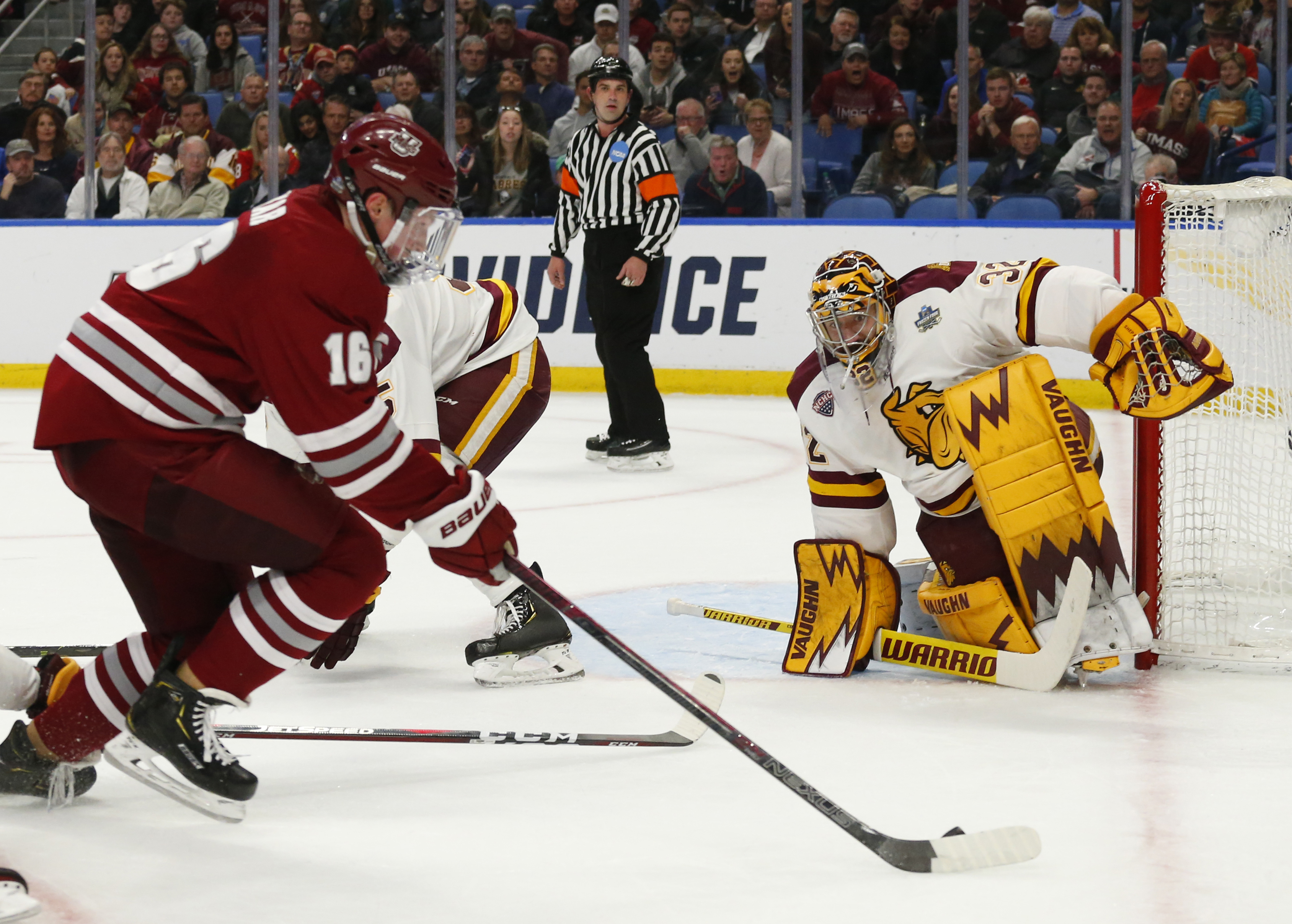 UMass defenseman Cale Makar looks to shoot on Minnesota Duluth goalie Hunter Shepard in the first period.