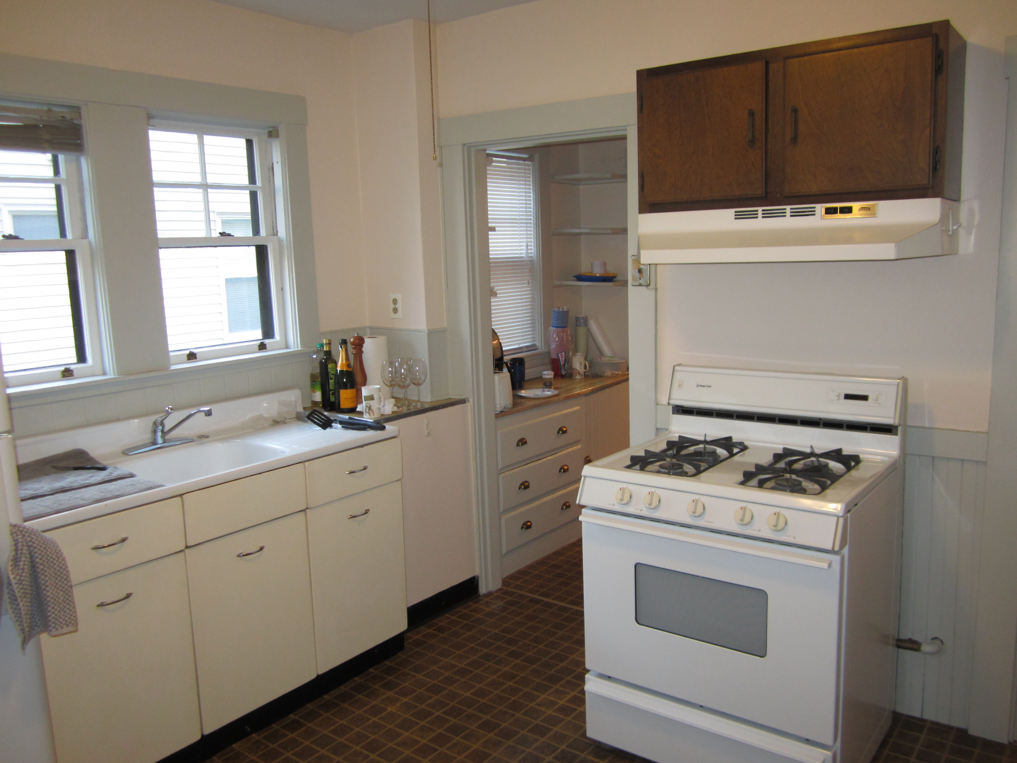 The original kitchen at Jim and Deb Miller’s home. (Renovated kitchen shown above.)