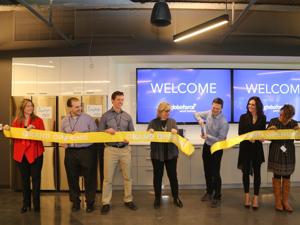 Globoforce CEO Eric Mosley cut the ribbon at the company’s new Framingham headquarters March 20.