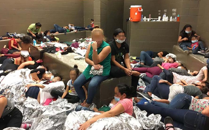 A overcrowded room of families was seen by inspectors on June 11 at the Border Patrol’s Weslaco, Texas, station.