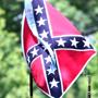 Civil War reenactors in Virginia held Confederate flags during Memorial Day services.