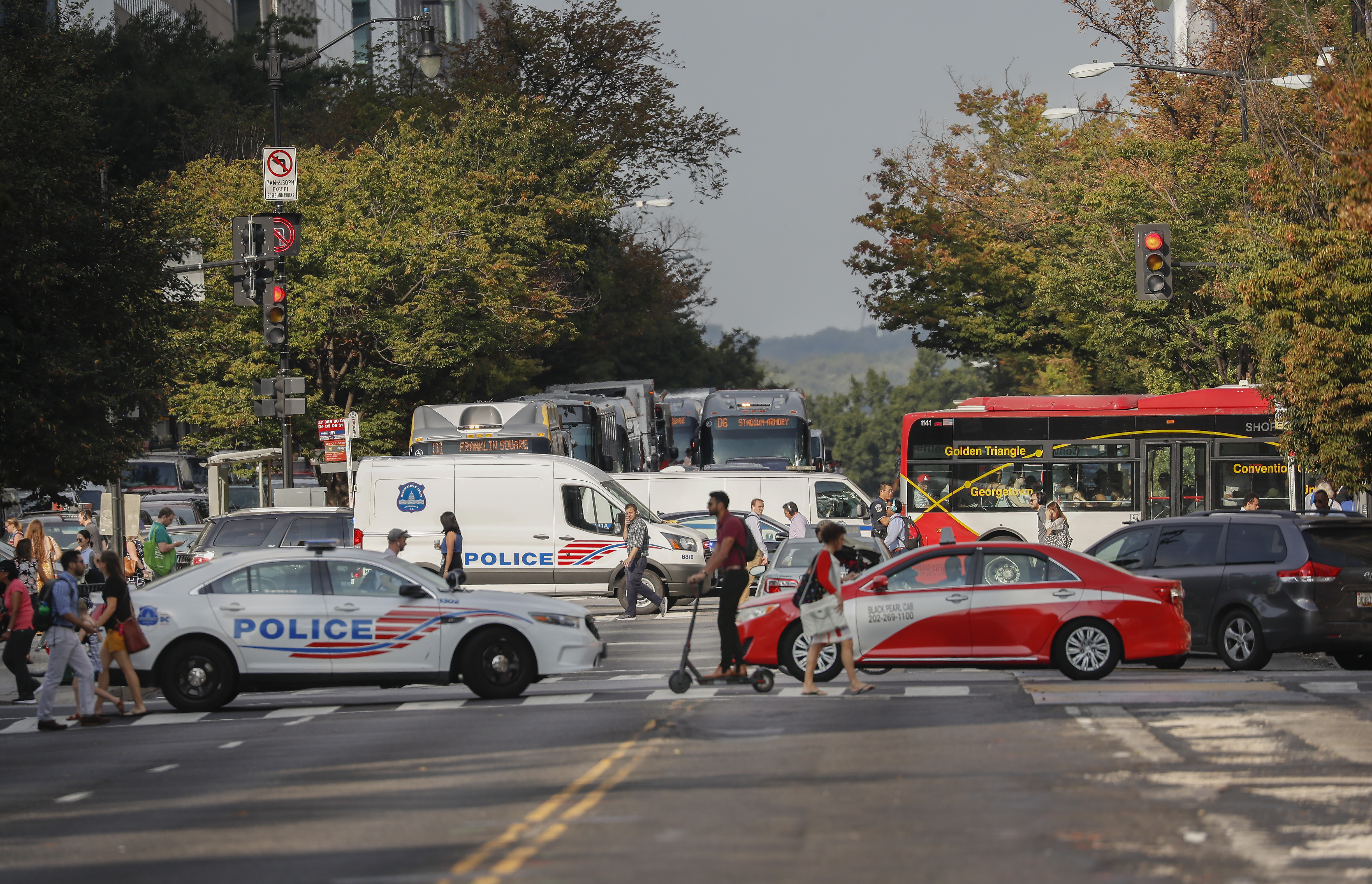 Police rerouted traffic because of a group of protesters blocking the intersection of K and 16th Streets.
