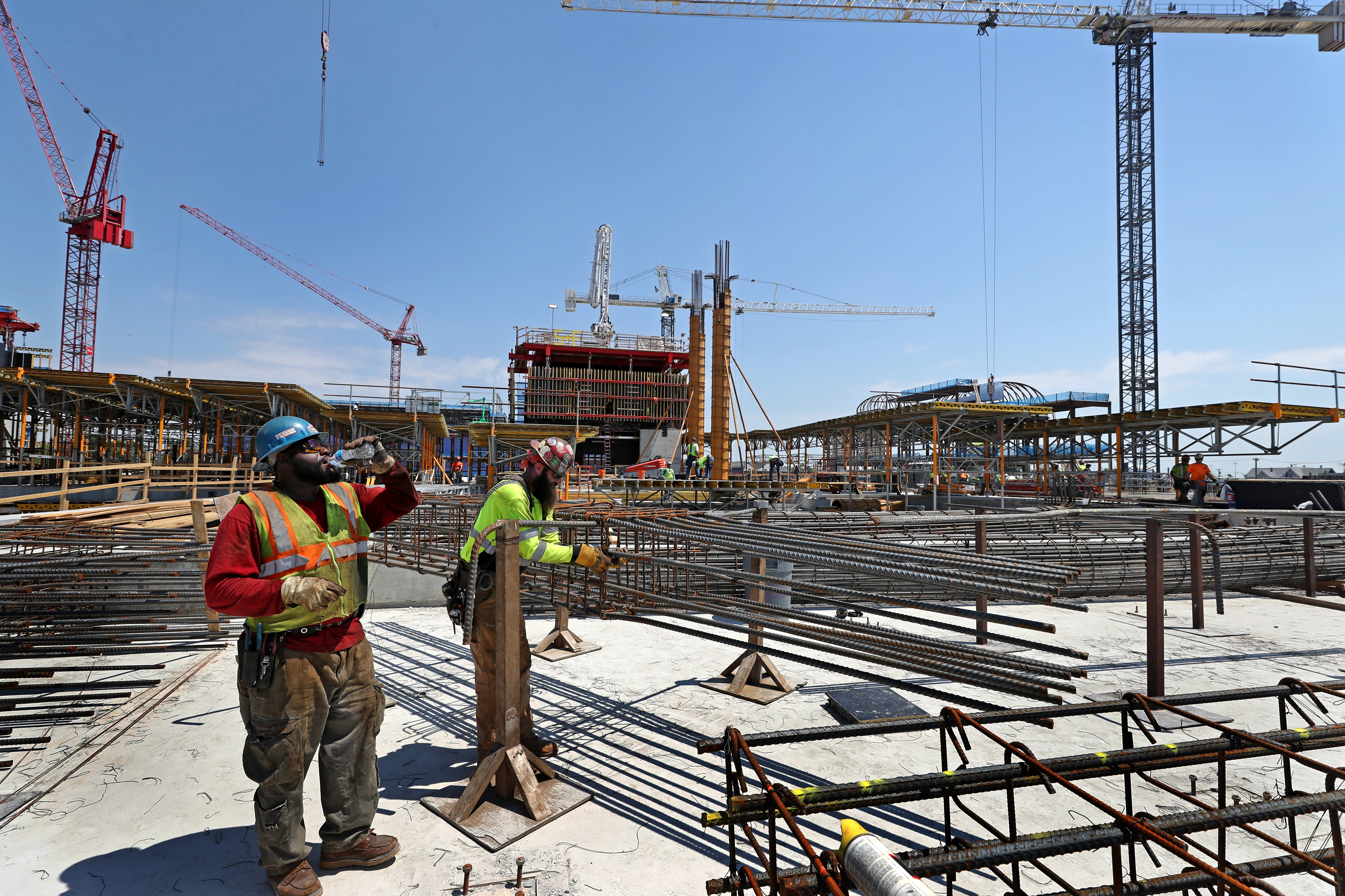 Workers stood at what will be the casino’s front lobby.