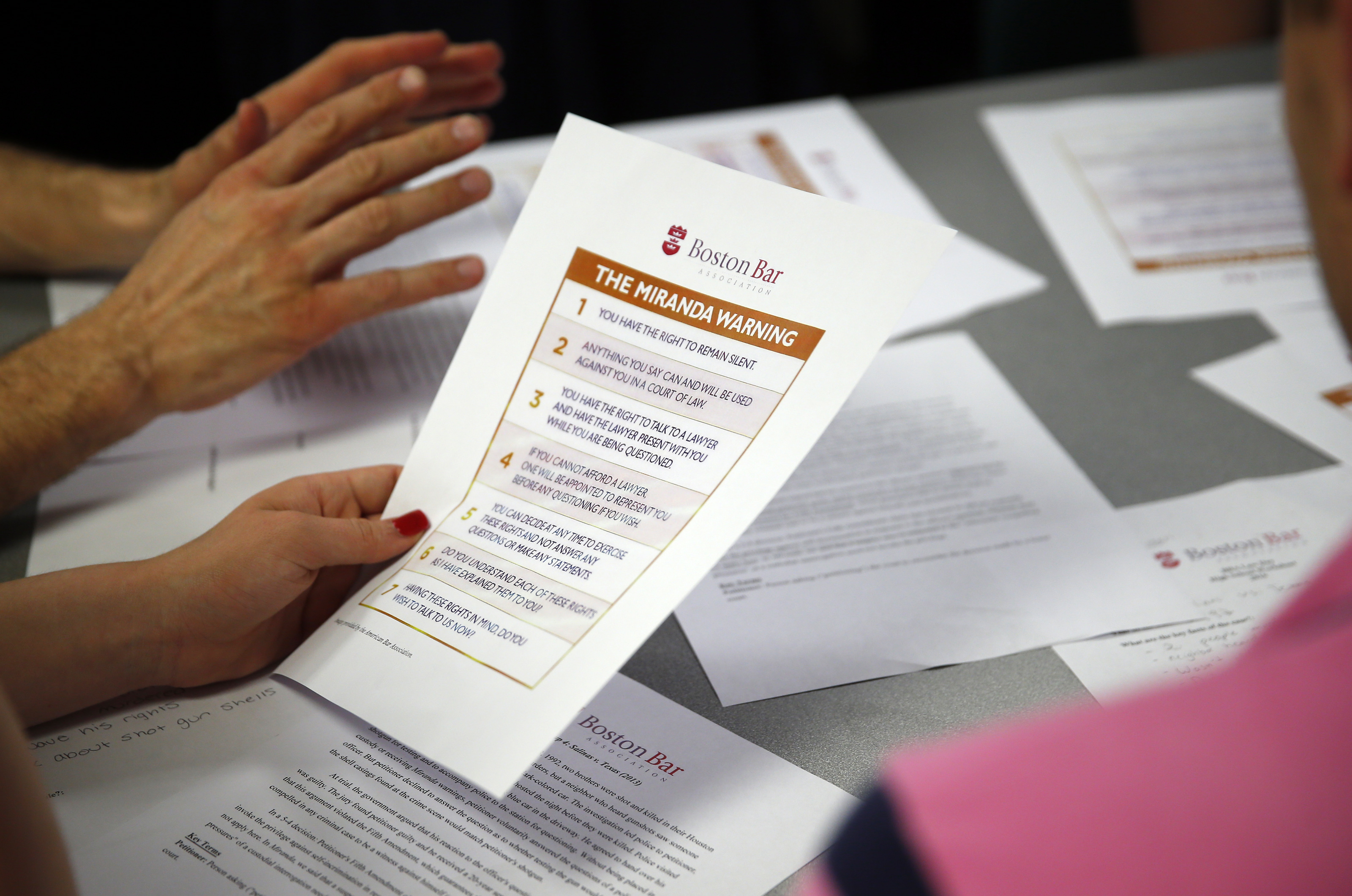 Students at Ostiguy High reviewed a summary of Miranda rights, the first of which is the right to remain silent.