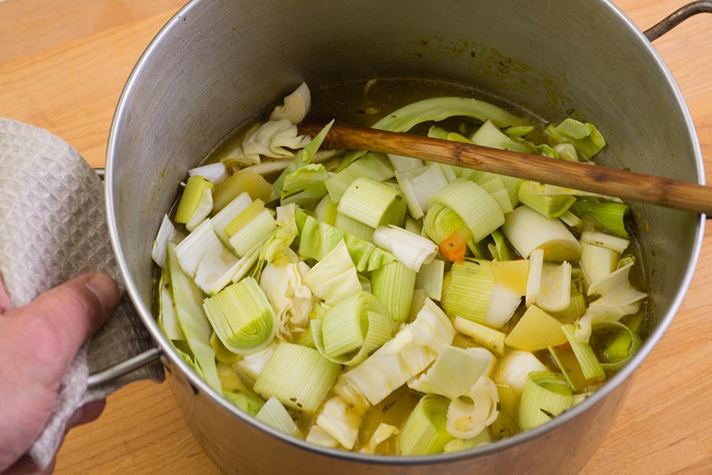 TIP: When you put the cabbage and leeks in the ham chowder, it will look like you have too much for the broth, but the vegetables will cook down.