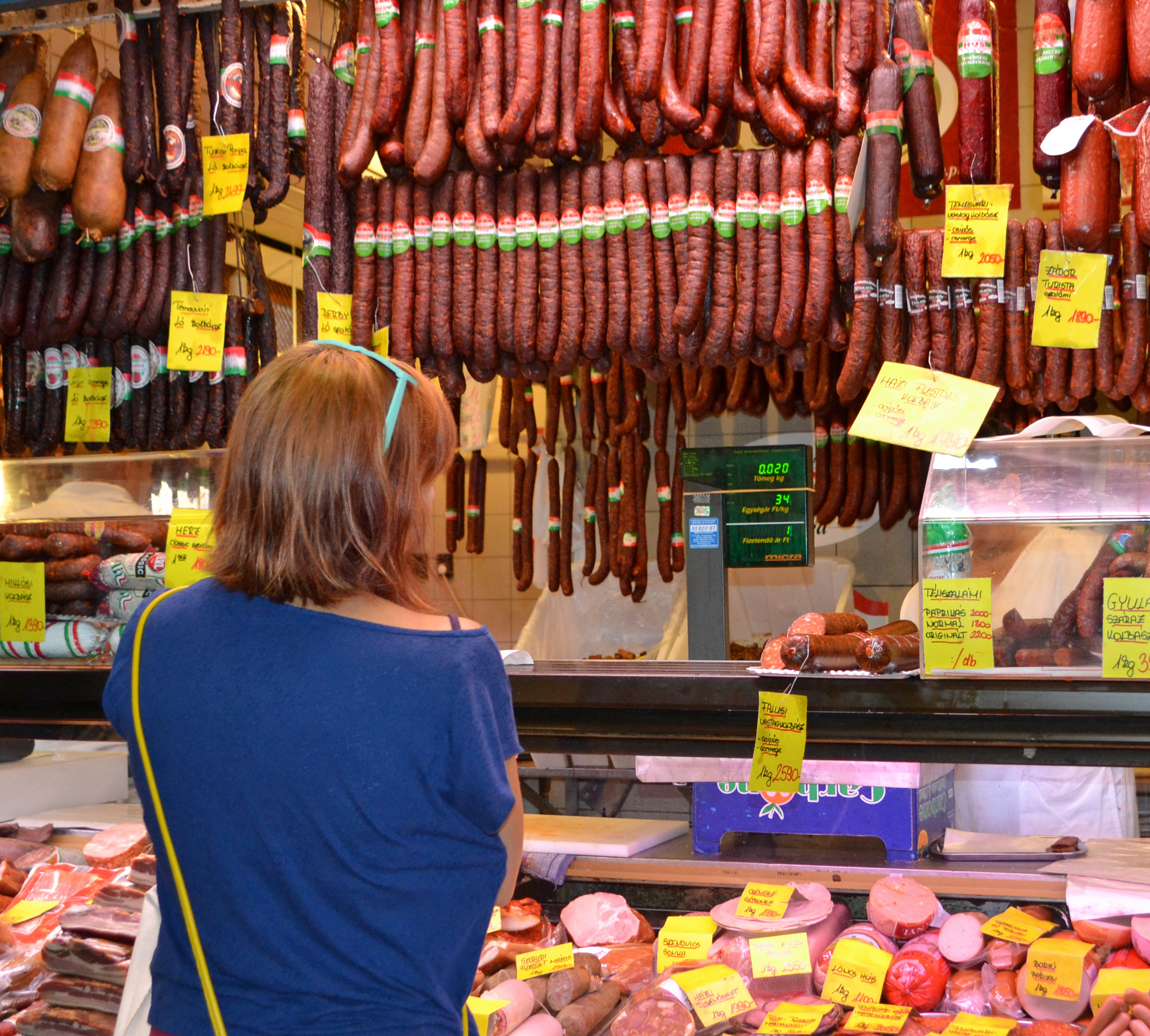 A sausage purveyor at the Central Market Hall in Budapest.