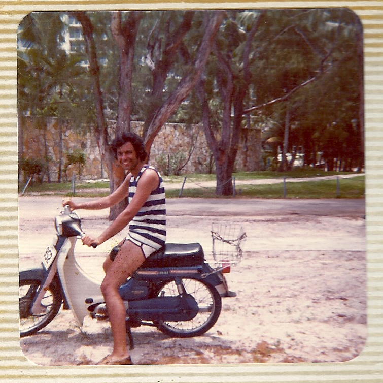 A family photos shows Leonard as a young man on a moped.