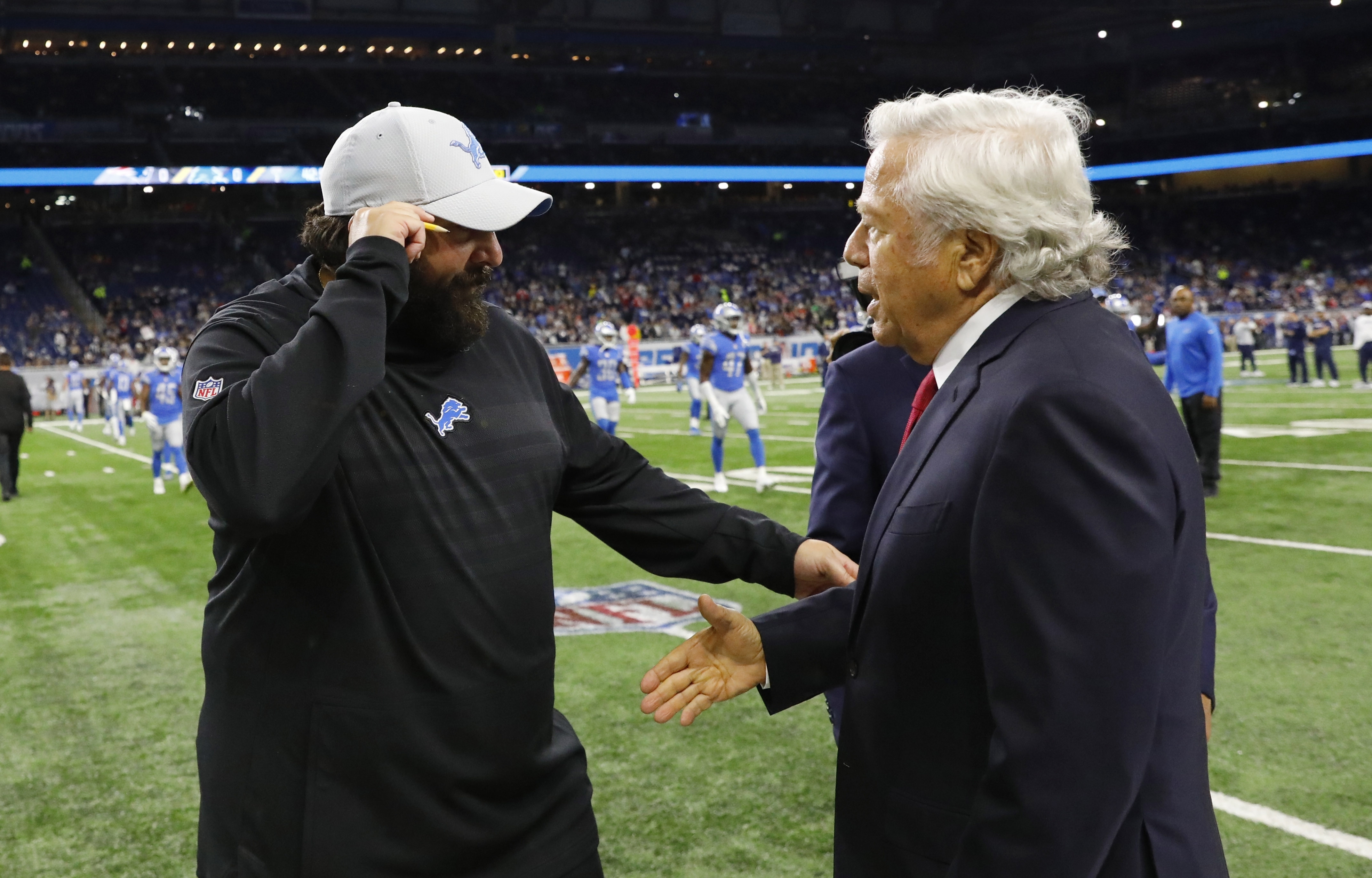 Matt Patricia and Robert Kraft greet each other before kickoff.