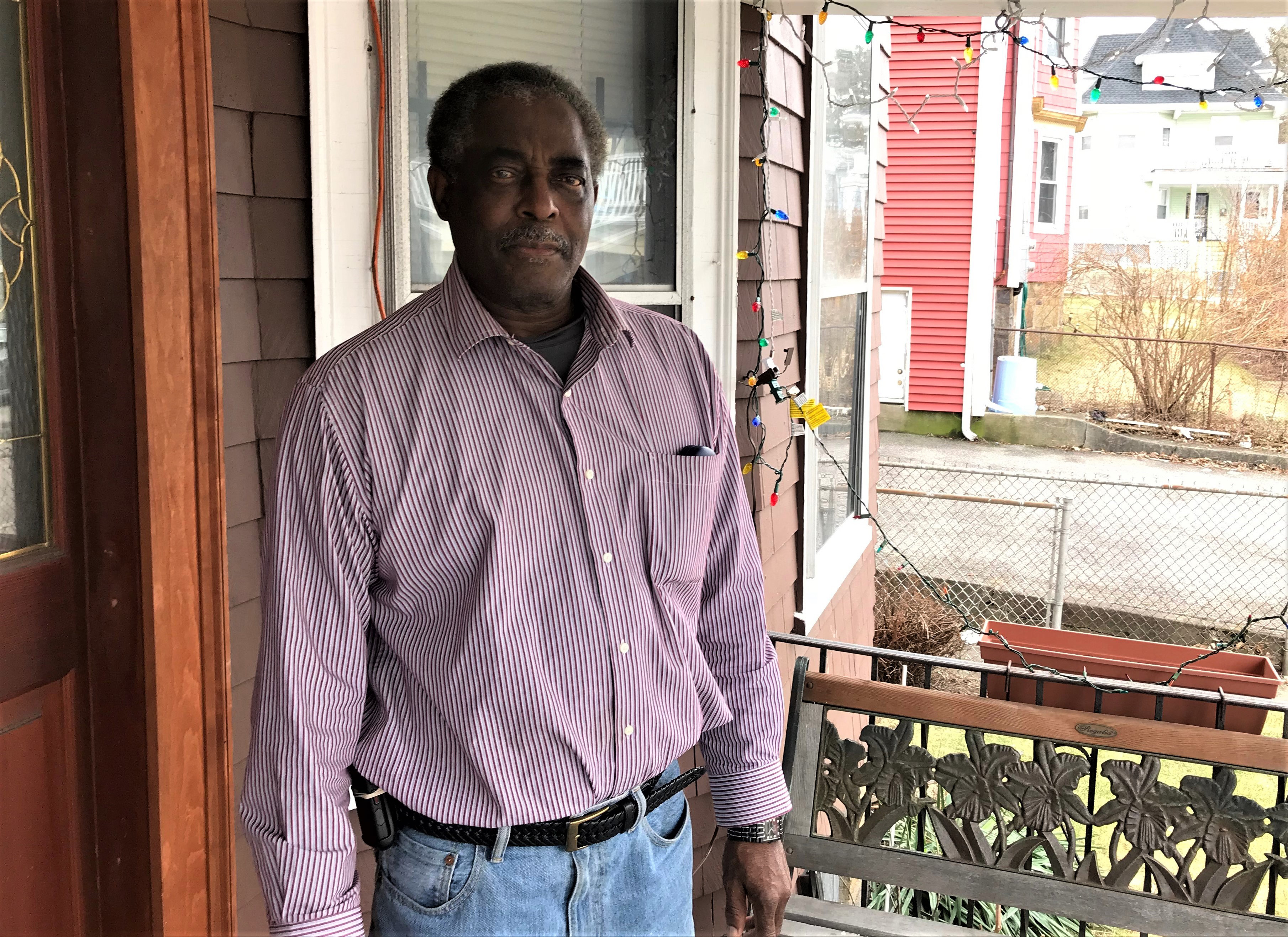 Royal Sibley on his front porch in Dorchester. He’s been working with Boston Public Schools to resolve a noise issue.