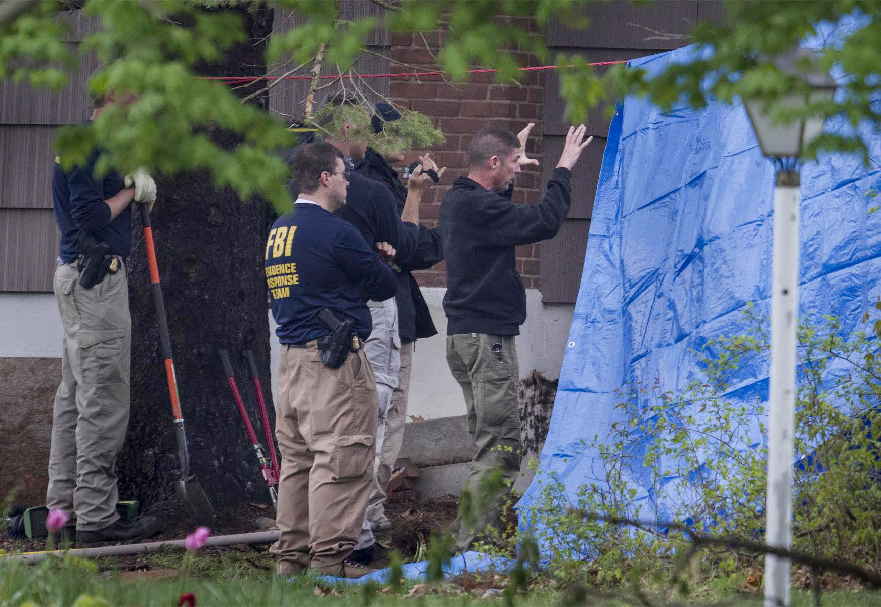 Much of the FBI search focused on an area around an underground oil tank on the property of Robert Gentile.