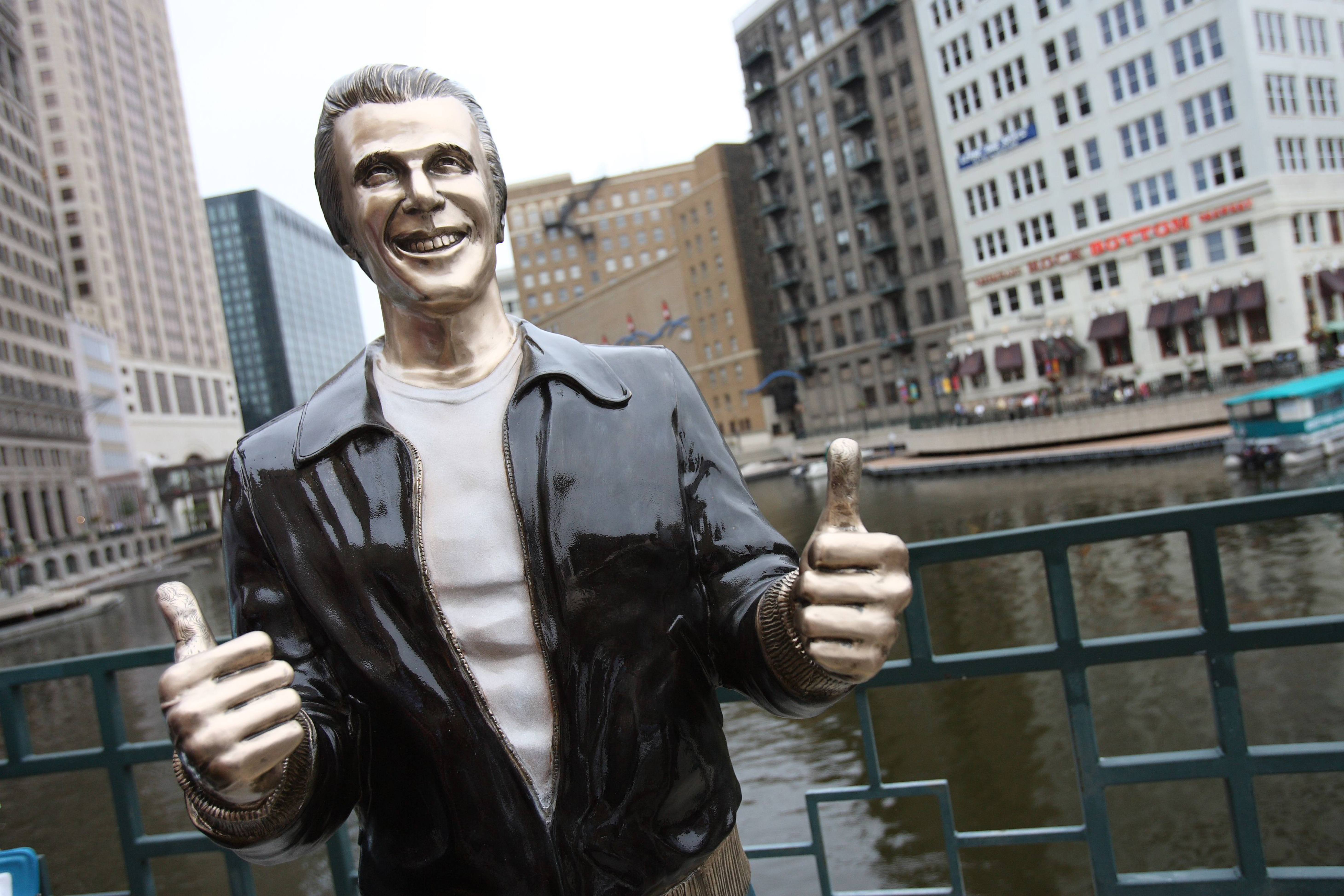 The Bronze Fonz on the Milwaukee Riverwalk just south of Wells Street in downtown Milwaukee.