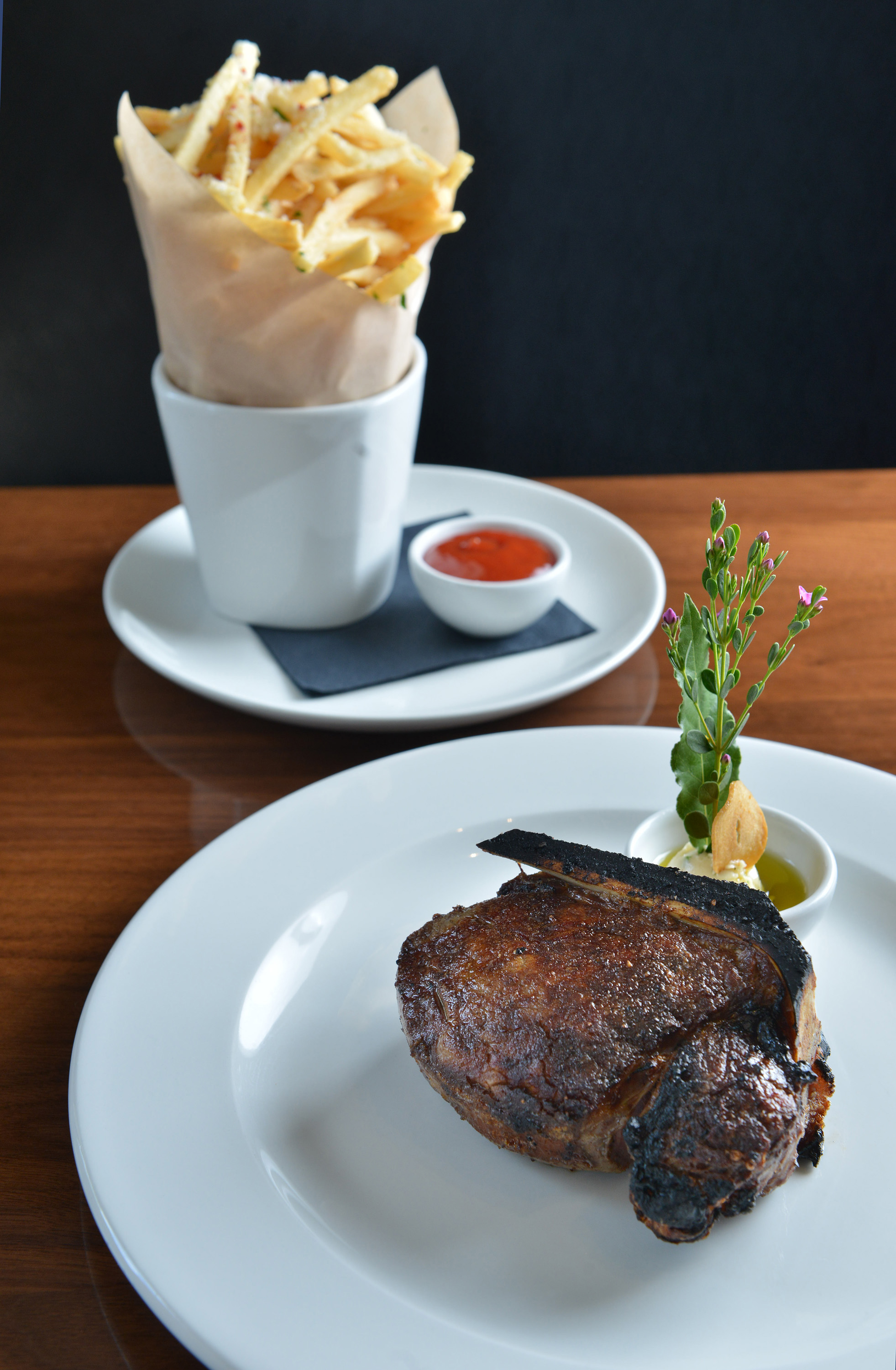 A bone-in filet with a side of truffle frites.