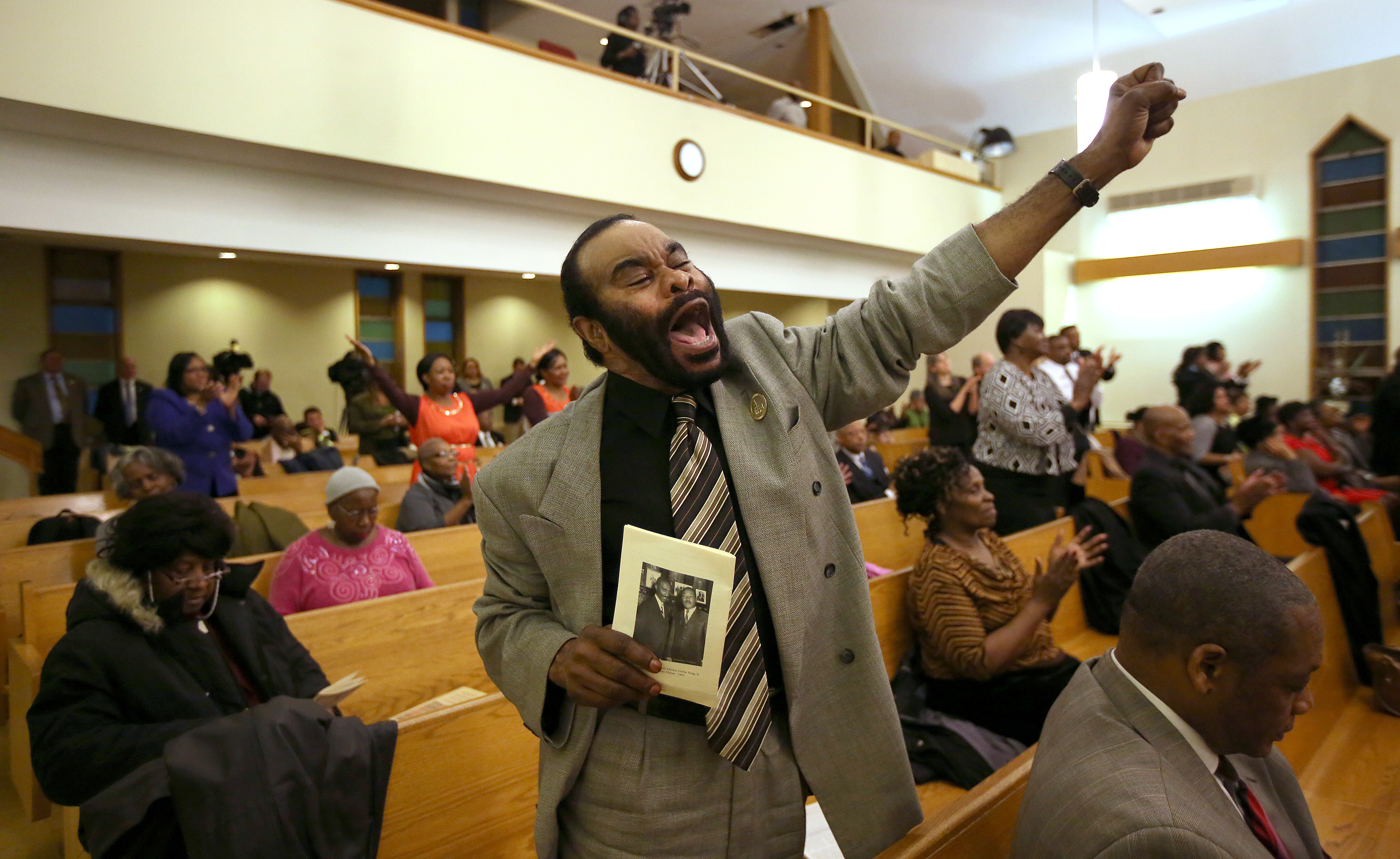 The Rev. Theodus Jordan gave praise during the event.