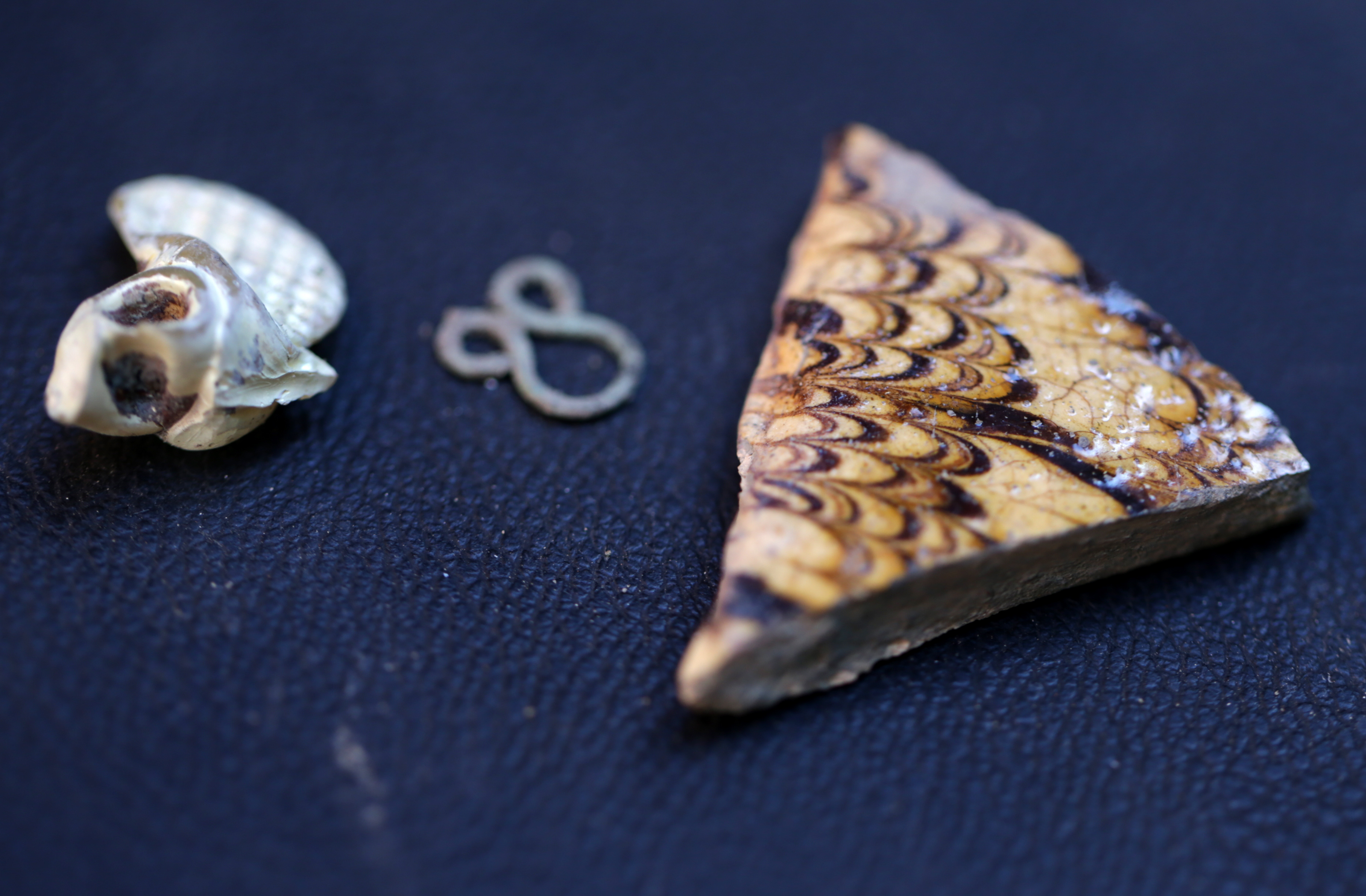 A dig near the Paul Revere House has found pottery and other artifacts that suggest a well-off family lived there.