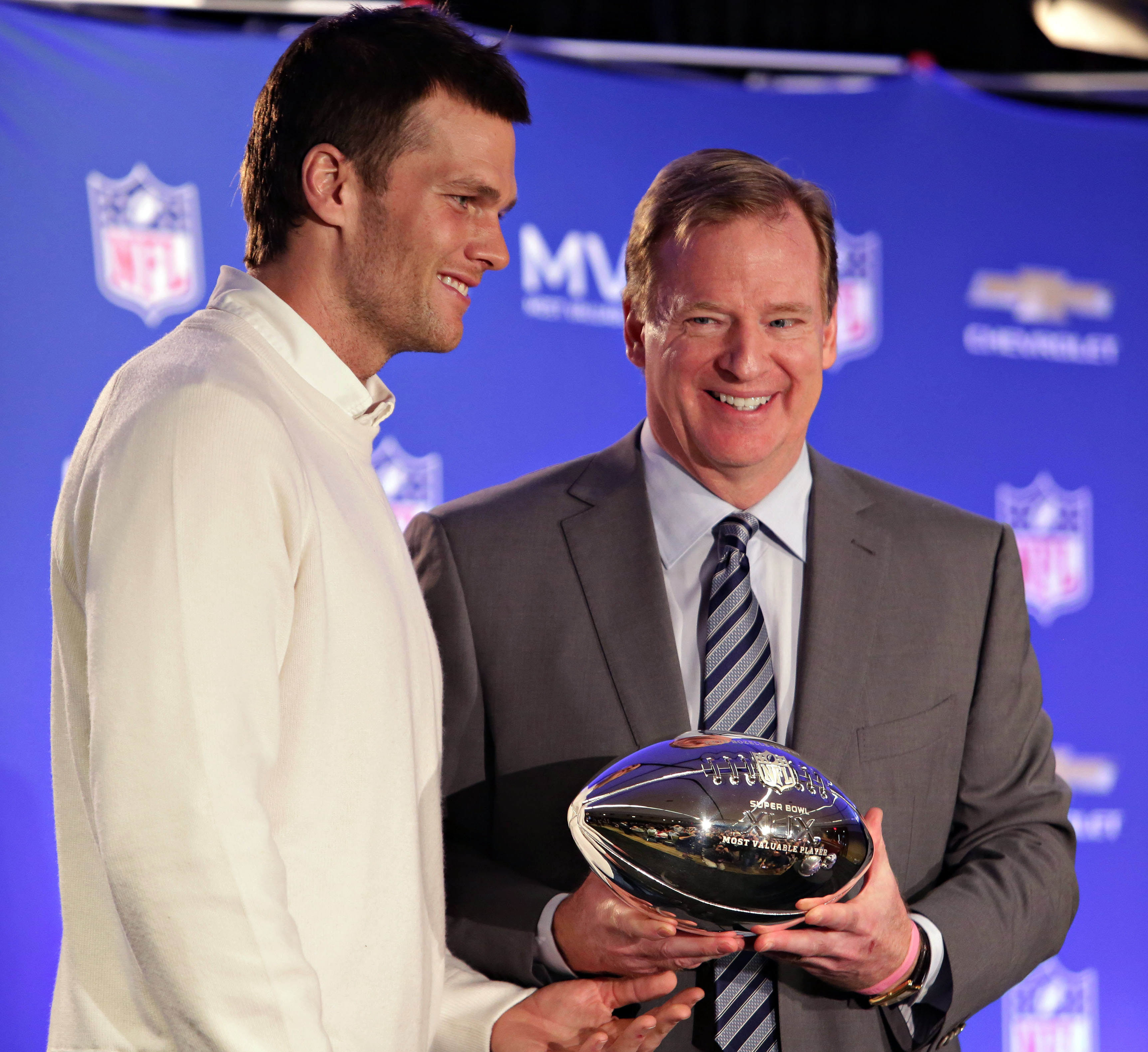 US District Judge Richard Berman is not-so-gently pushing Tom Brady (left) and Roger Goodell (right) to settle their dispute.