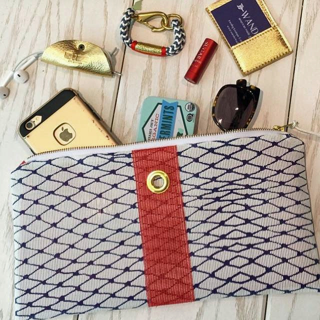 13madeinne - ***WARNING: LO RES, do not use for more than 1.75 columns *** - Maine-based designer Alaina Marie Harris makes wristlets, wallets, and clutches from marine-grade materials, inspired by lobstermen's bait bags. (handout)