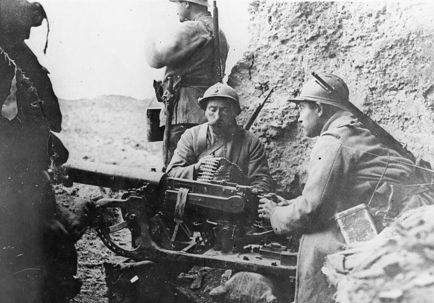 French troops manned a captured German Maxim MG 08 machine gun (mounted on a sledge) at Fort Douaumont, Verdun in 1916.