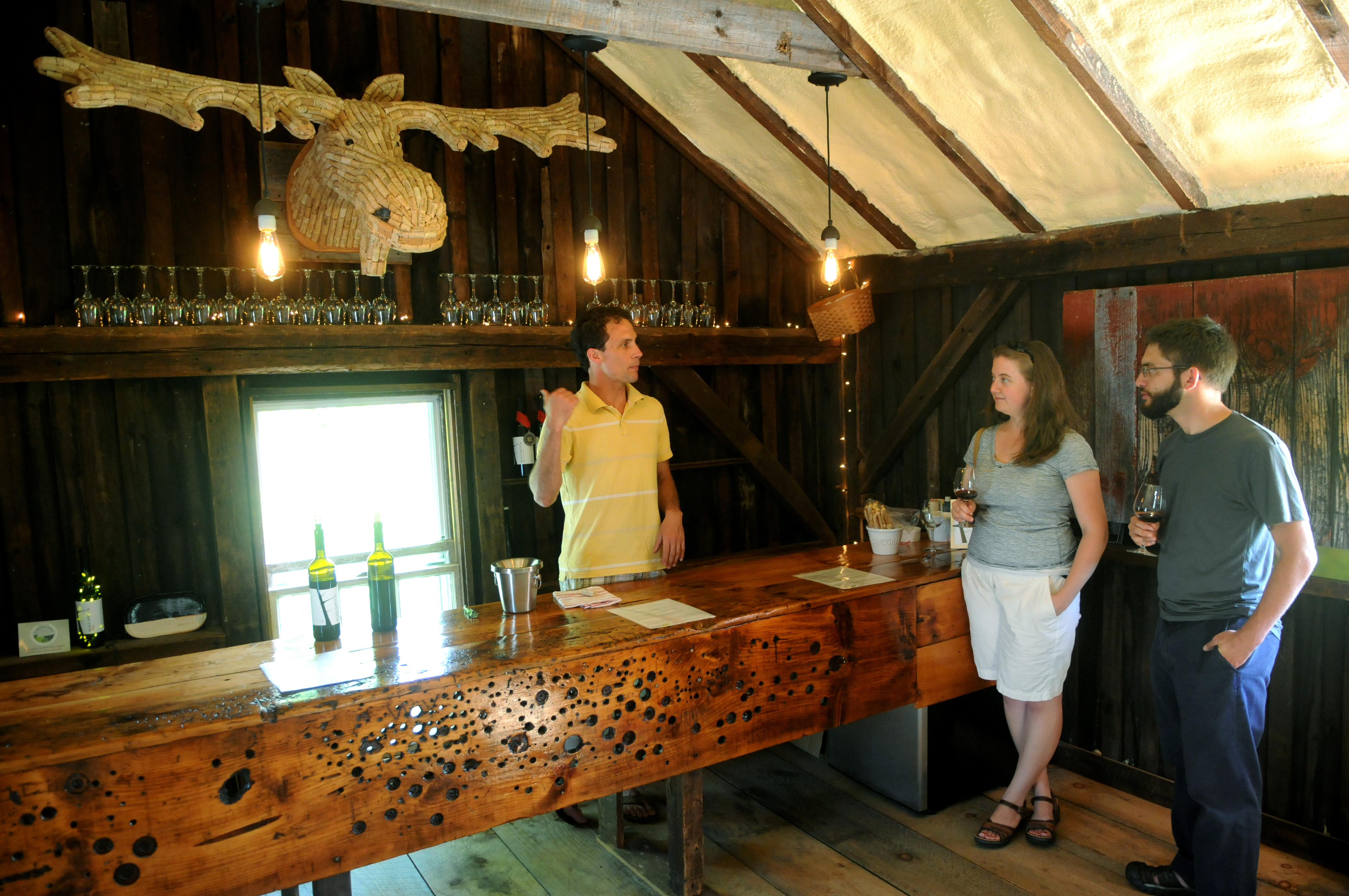 Tasting with co-owner Ian Modestow (left) and Kate and Cory Telman.