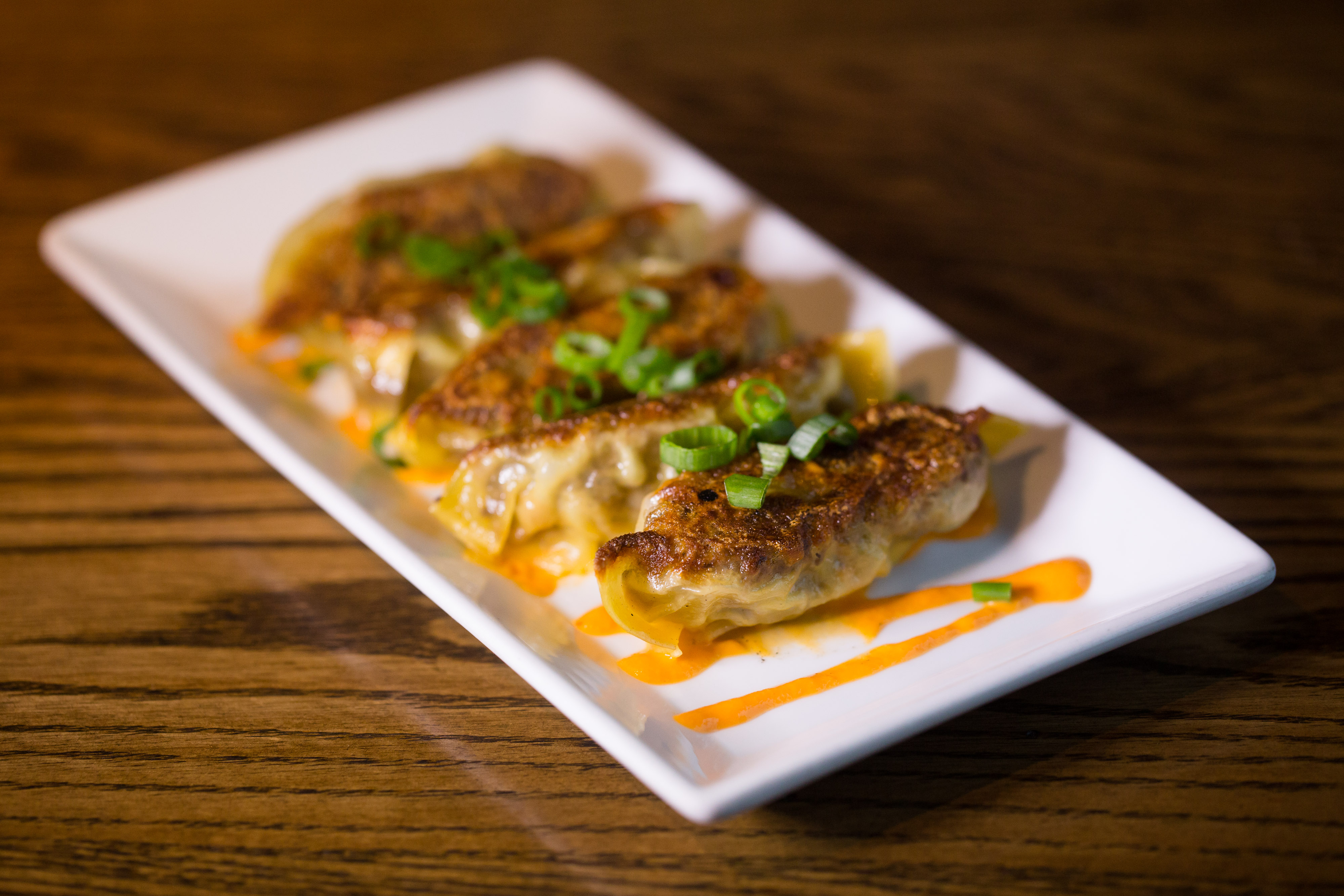 At Blue Dragon, braised short rib and Chinese celery pot-stickers.