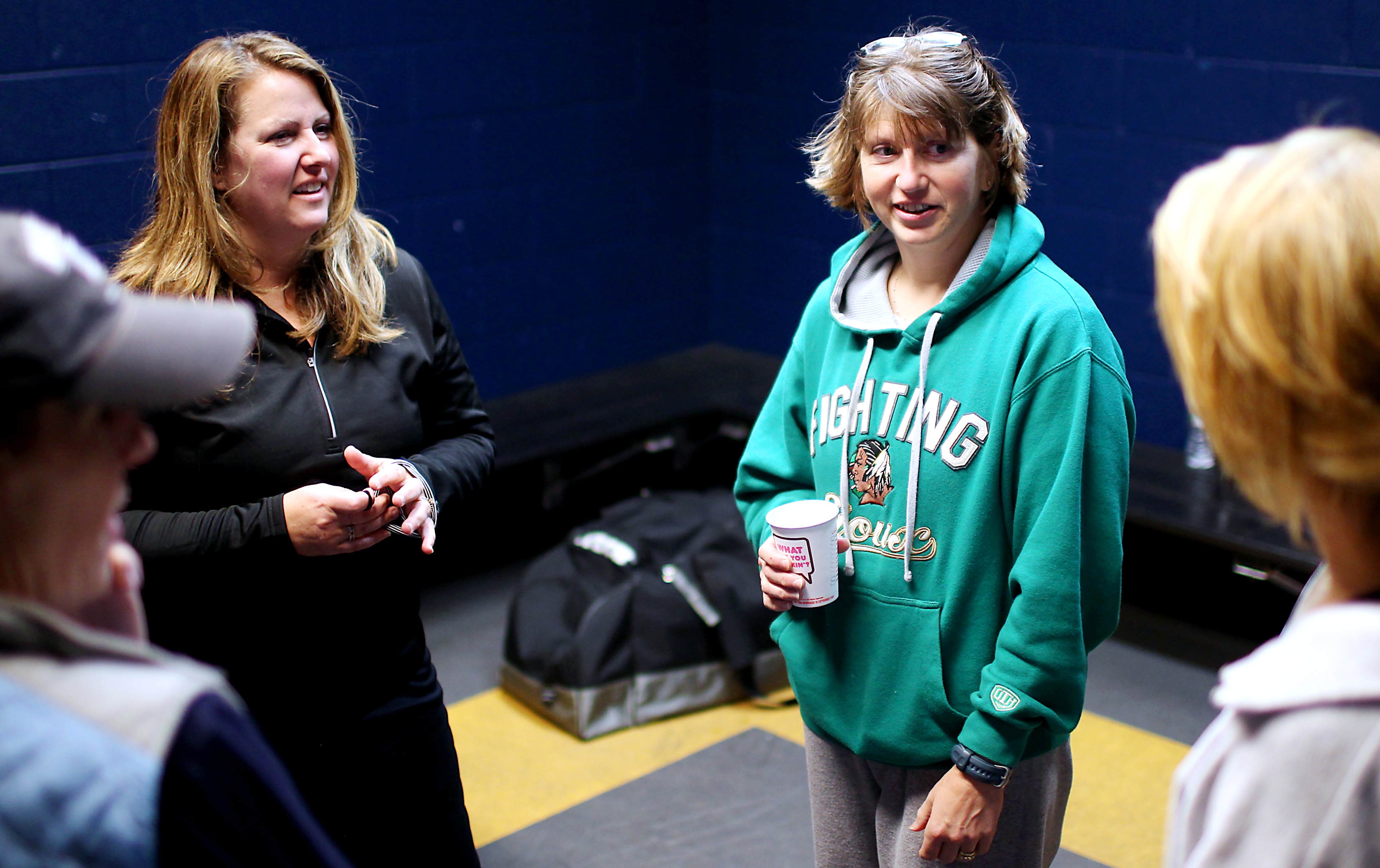 Janet Casselman, Missy Pickett, Amanda Anderson, and Linda Thurlow discussed candidate Mitt Romney after hockey practice at the Rinks at Exeter in Exeter, N.H.