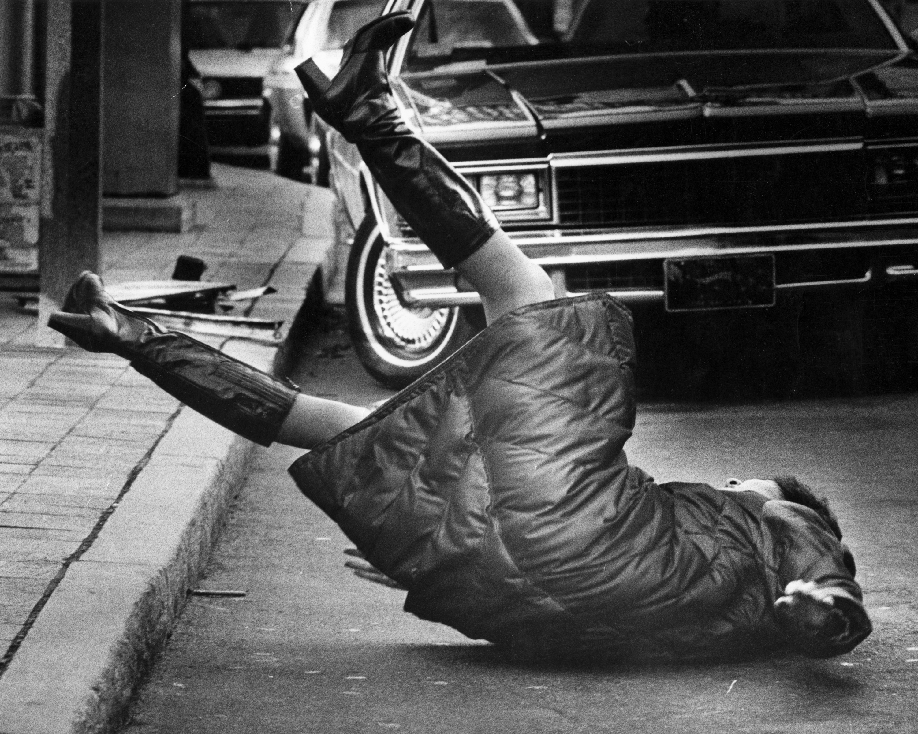 A woman was knocked over in 1980 by strong winds in Boston's Financial District.