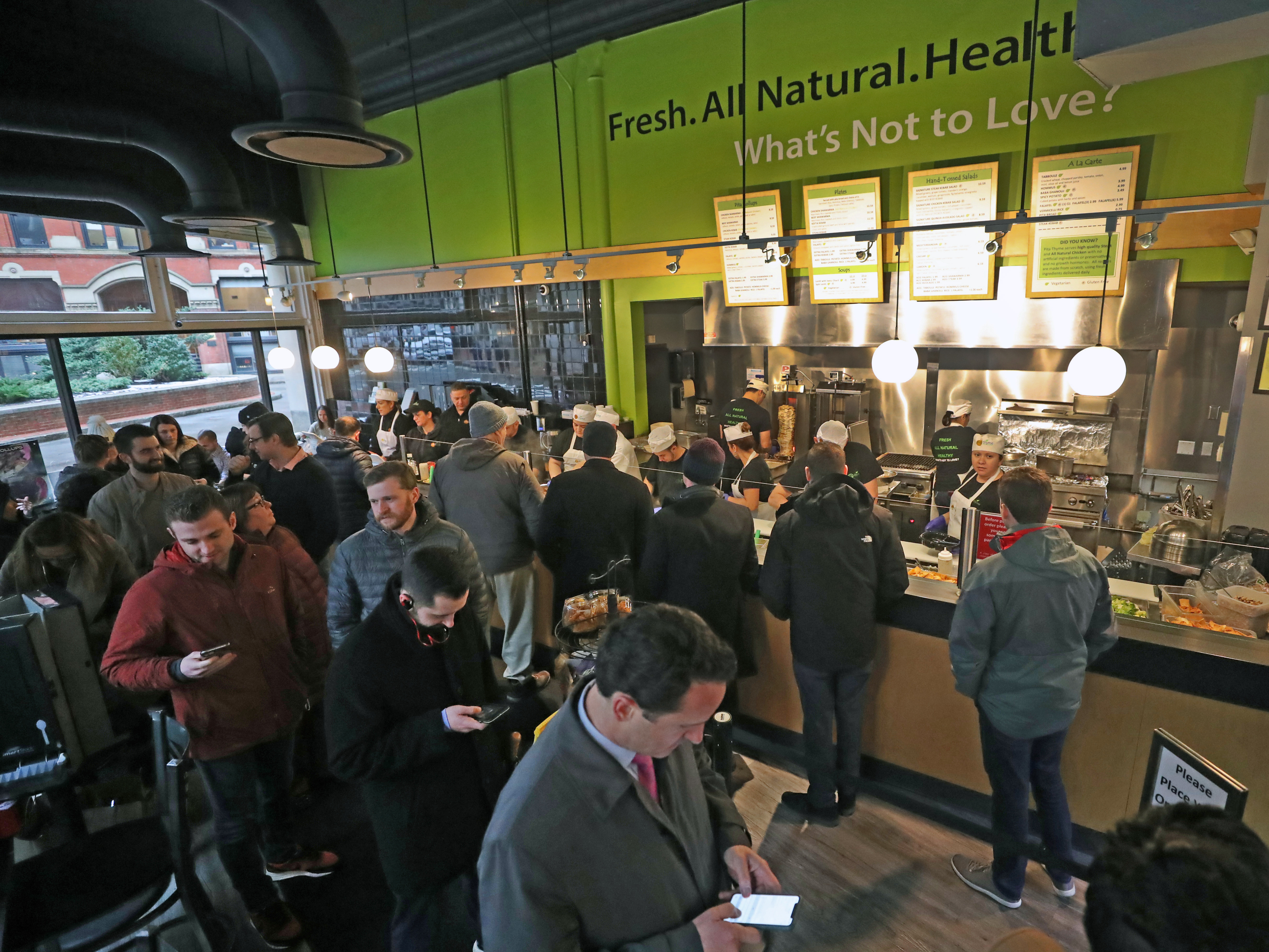 Customers waited in a line at Pita Thyme.