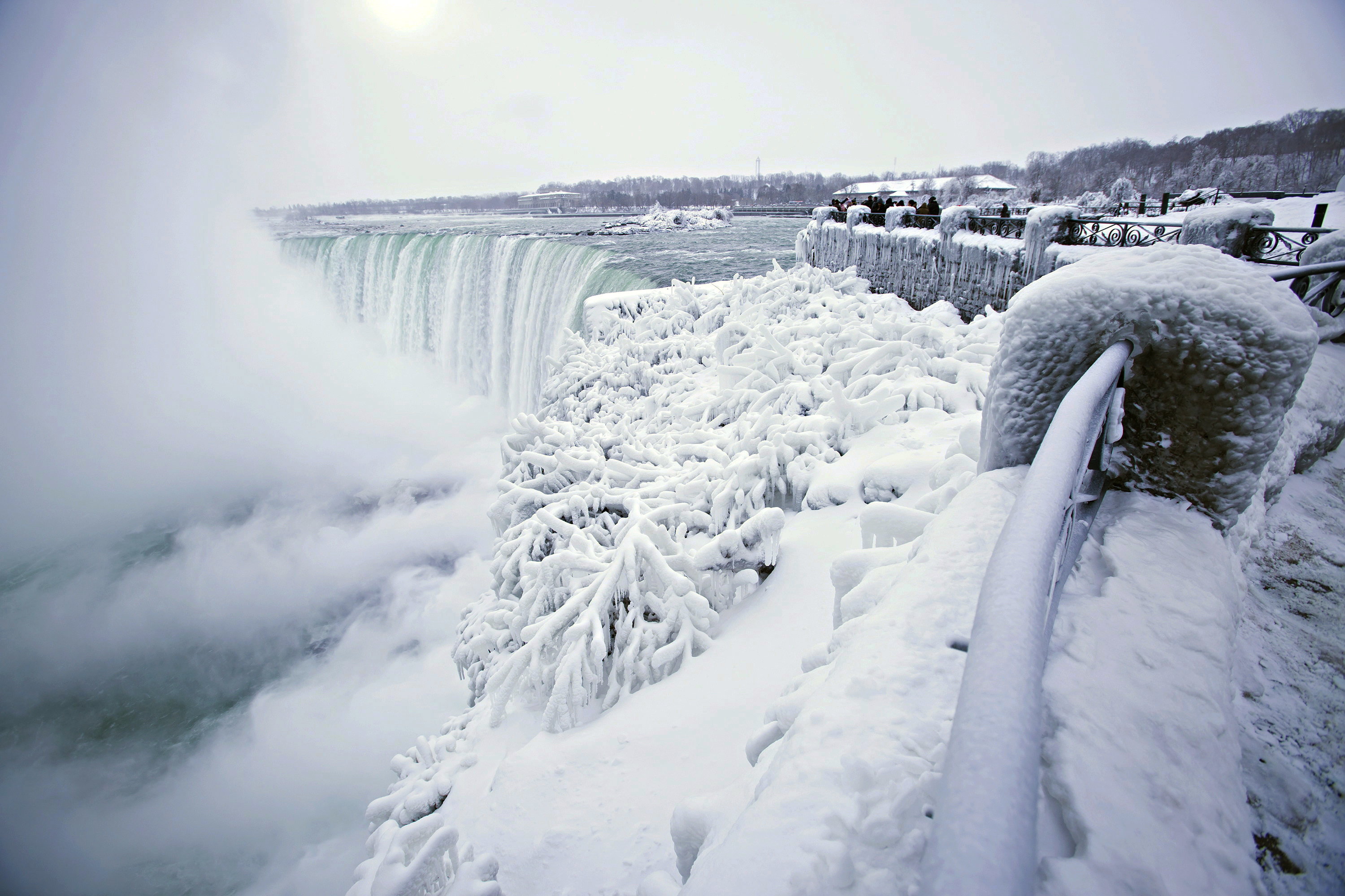 Visitors took photographs at the brink of the Horseshoe Falls on Friday.