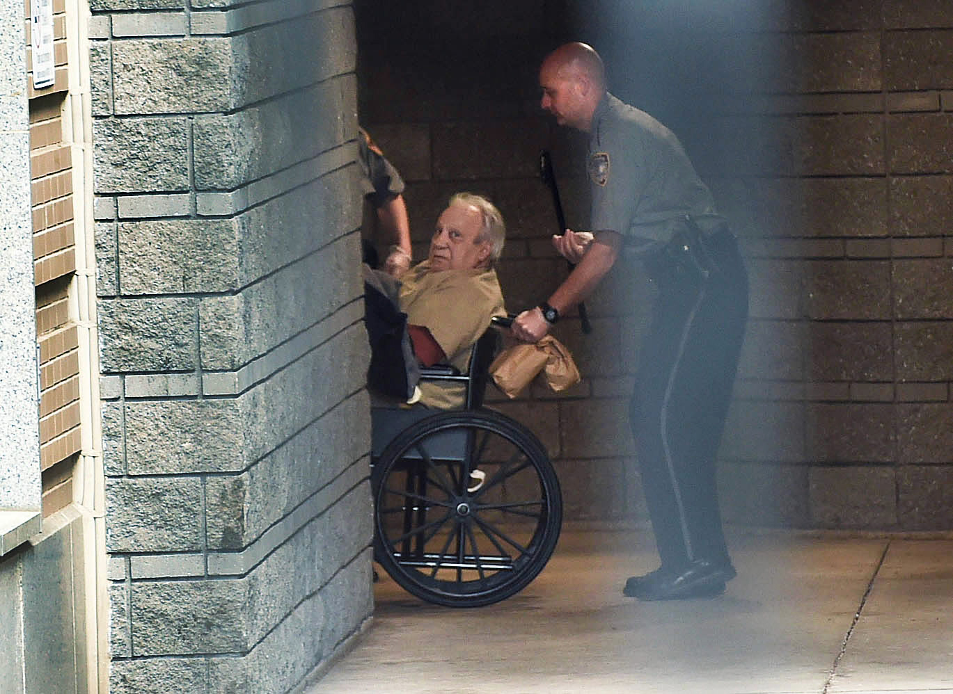 Robert Gentile was brought into a federal courthouse in a wheelchair in April 2015 in Hartford, Conn.