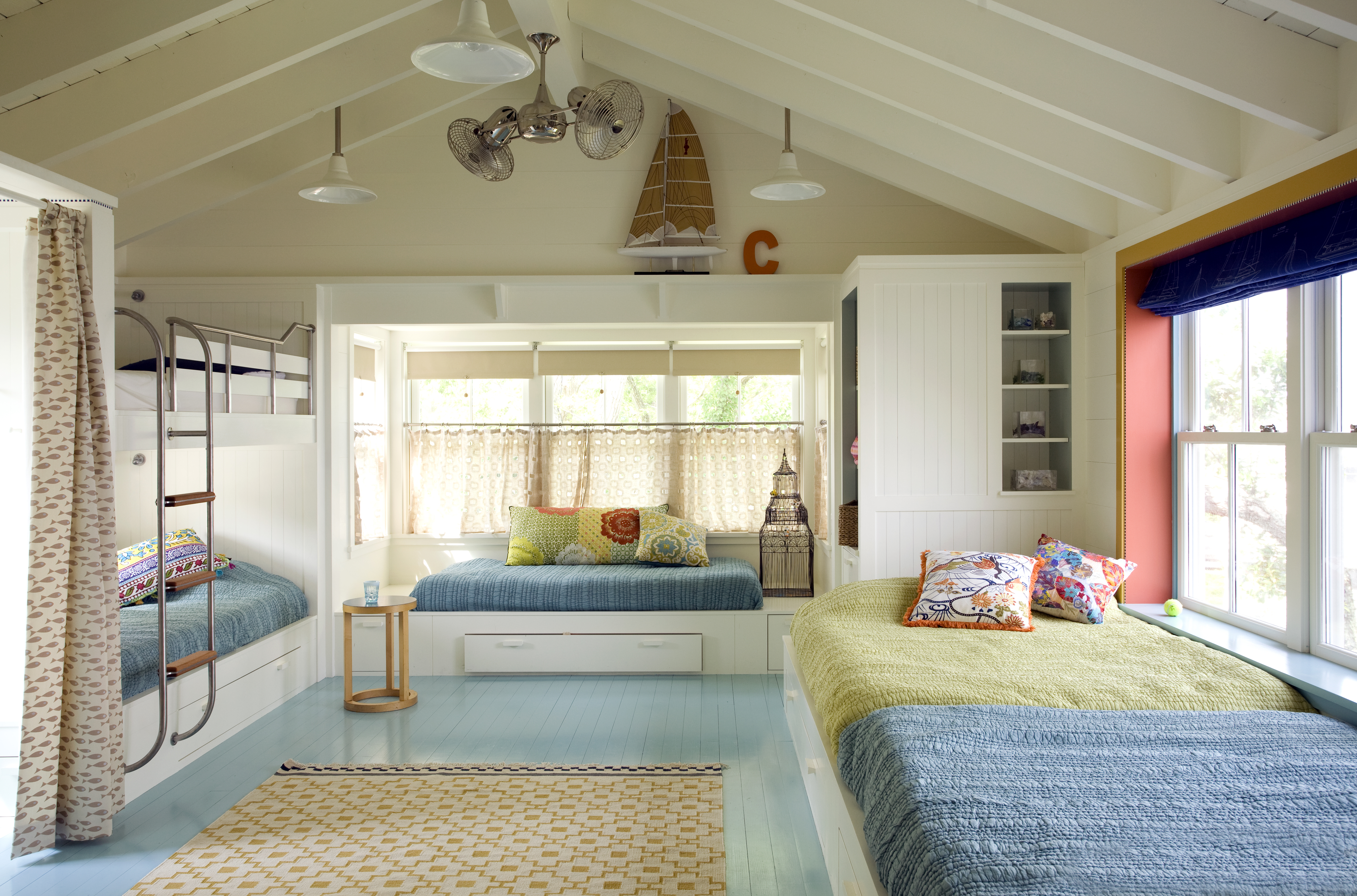 In a Cape Ann project, Wellesley designer Andra Birkerts deployed a pale aqua tone as a restful underpinning to a children’s bunk room.