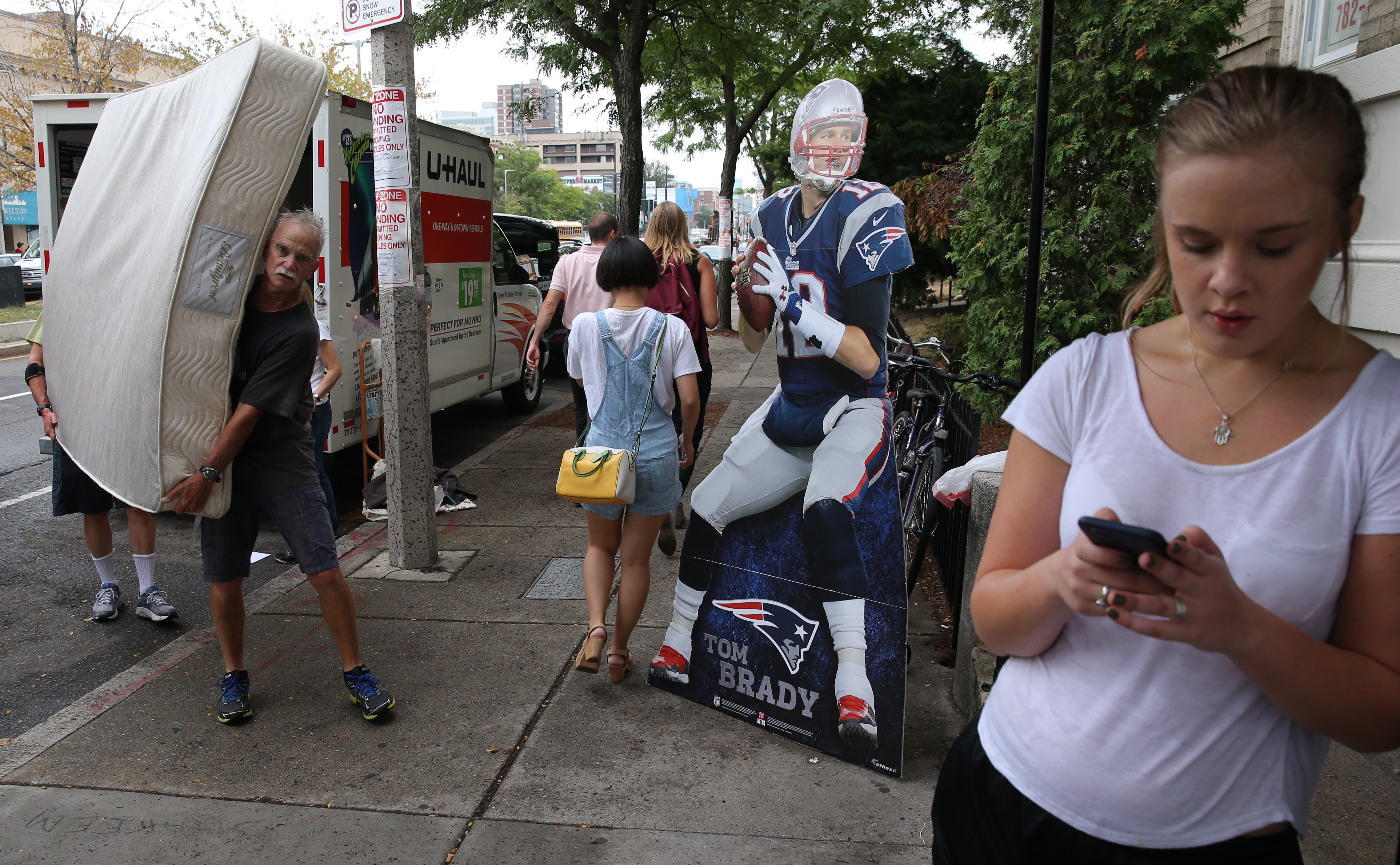 A cutout of Tom Brady oversaw moving activities in Allston on Sept. 1.
