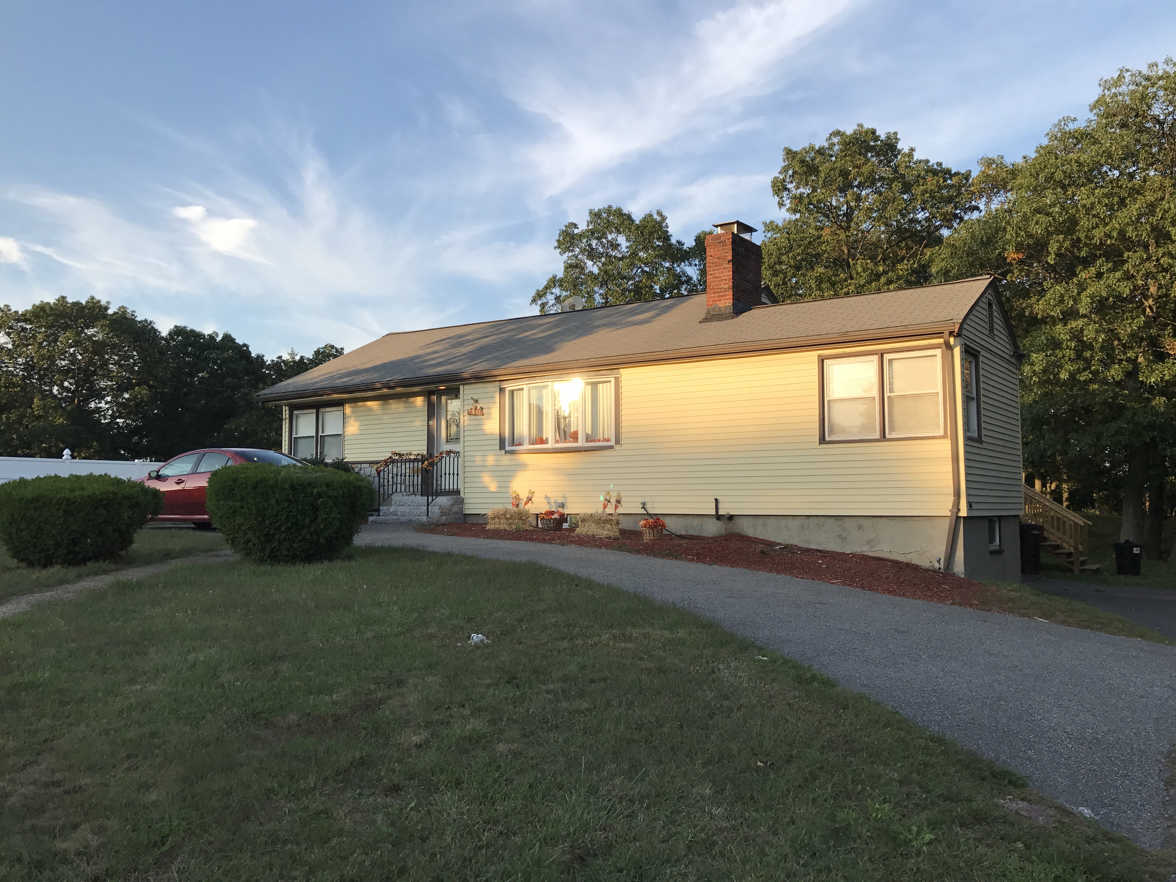 A car was in the driveway of the MacCormacks’ home Tuesday. Andrew MacCormack is accused of killing his wife, a 30-year-old Lynn teacher.