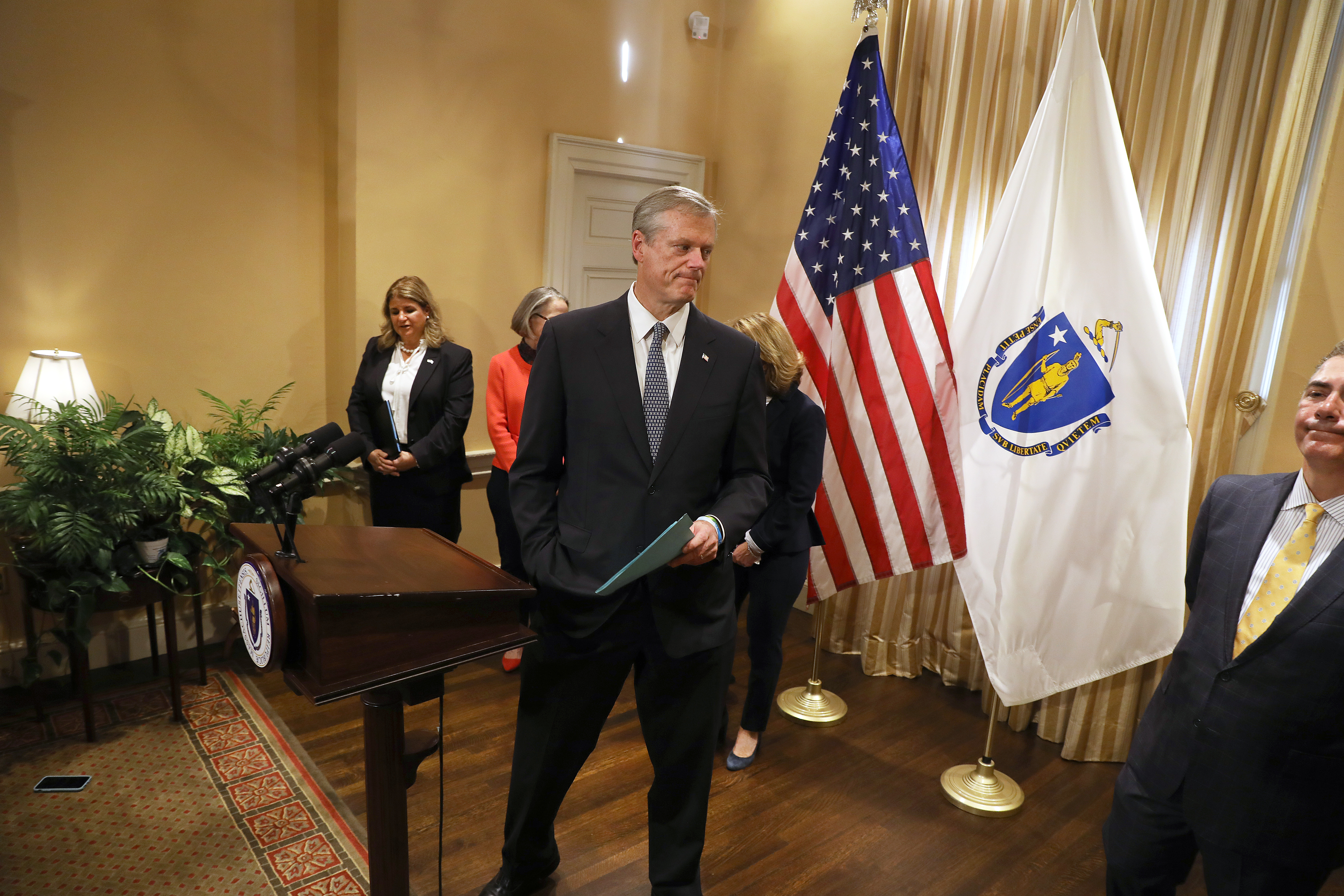 Governor Charlie Baker moved away from the podium after his remarks Monday at the State House.