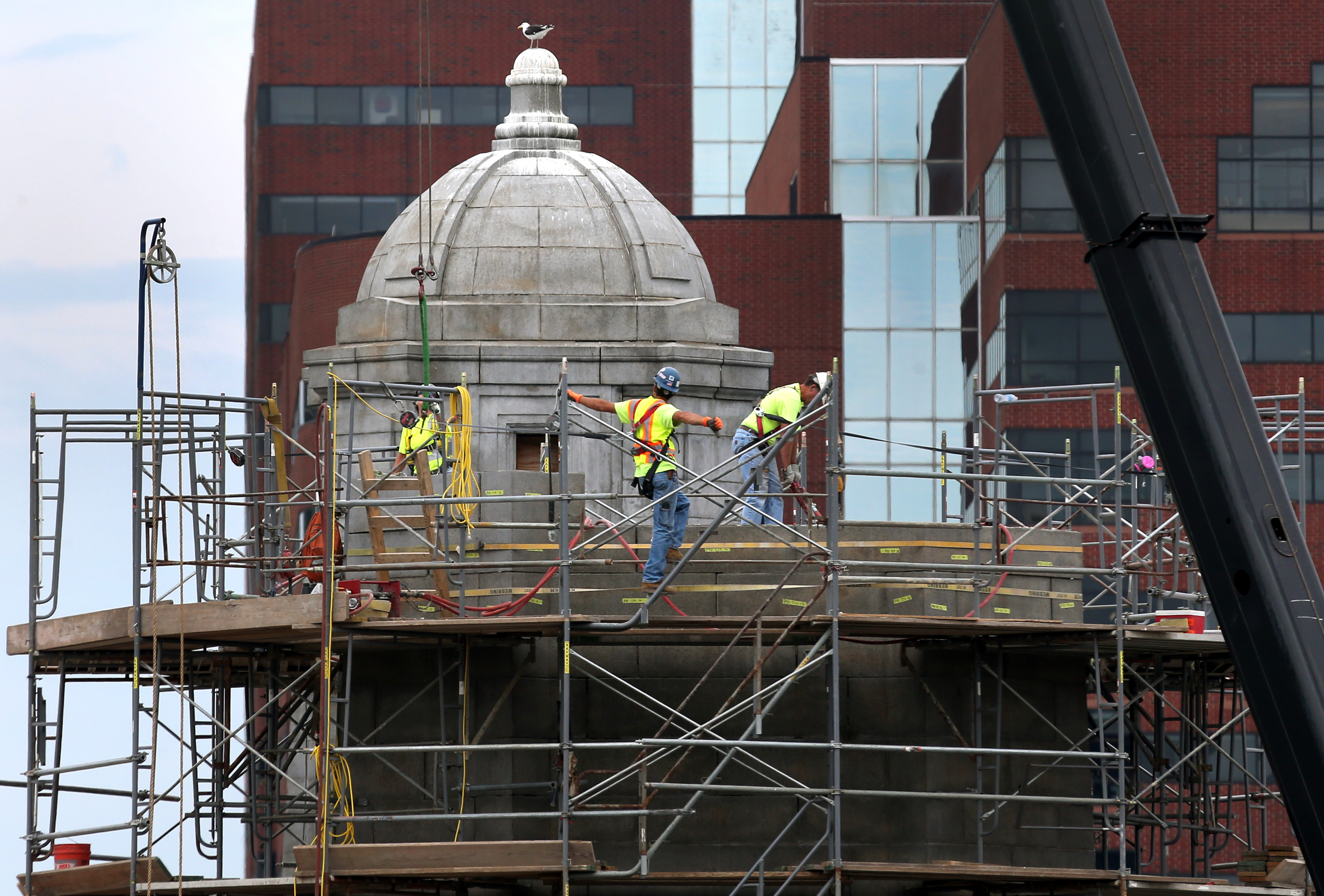 Crews worked on one of the Longfellow Bridge’s towers in May.