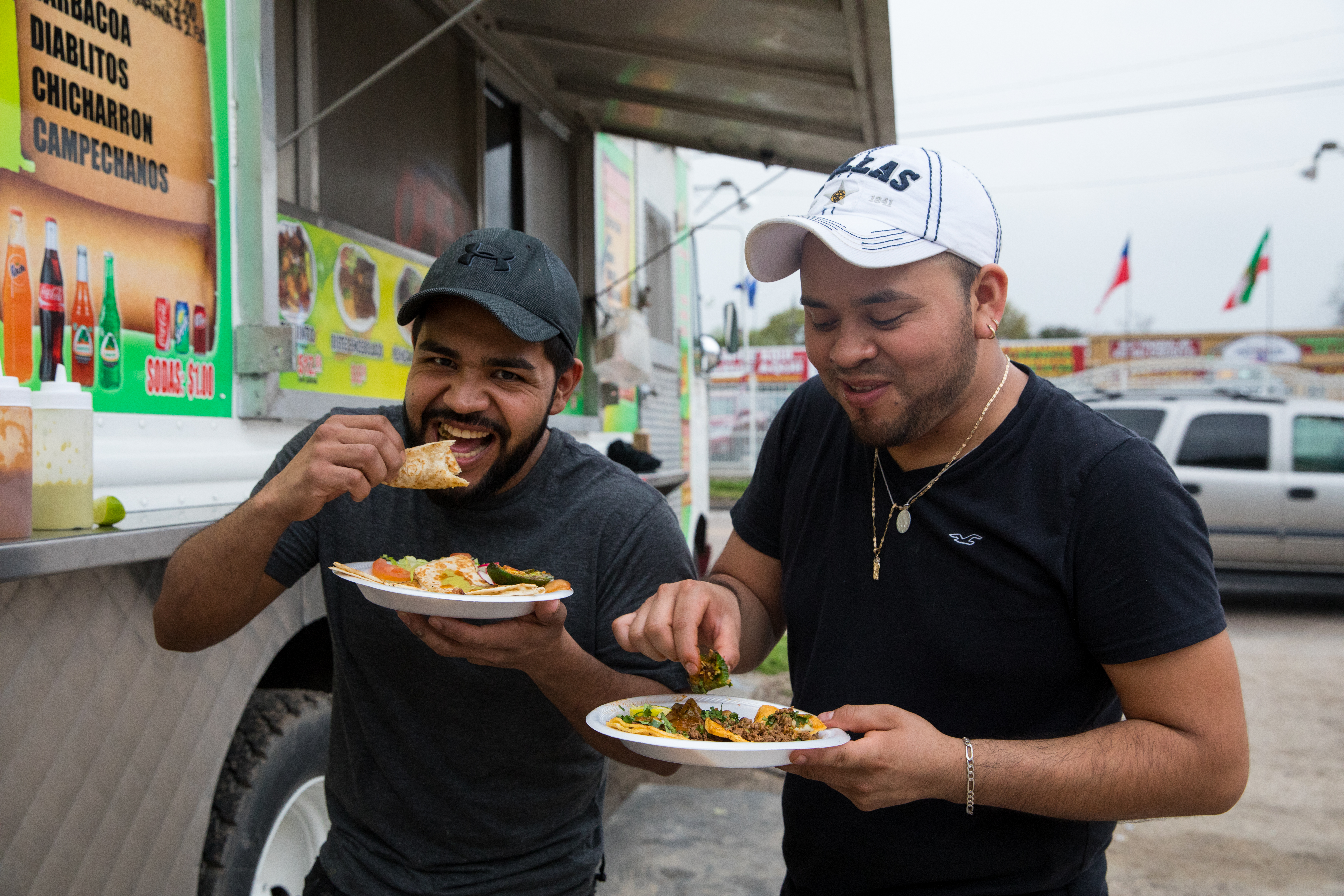 Customers enjoy tacos at Taqueria Las Glorias.