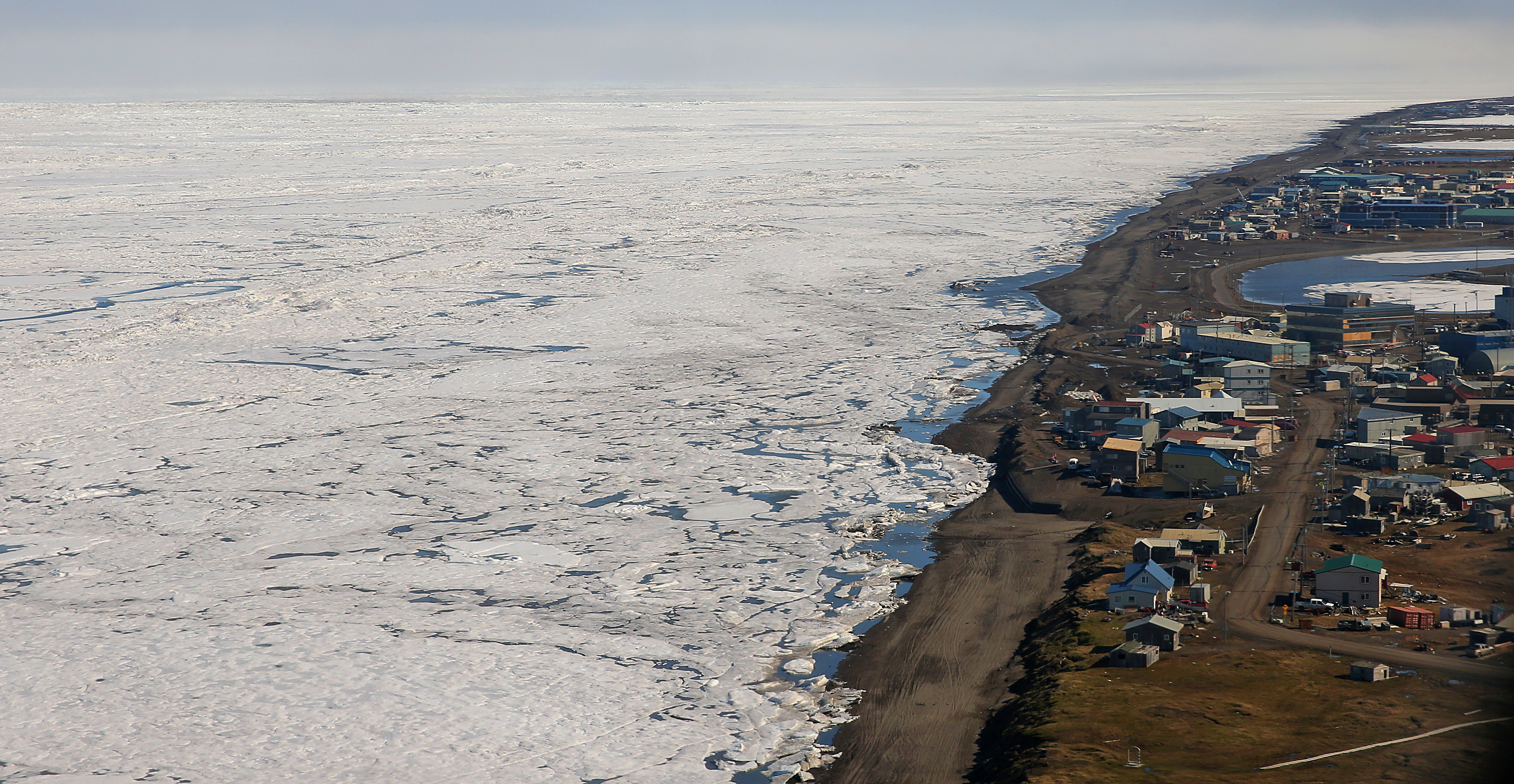 Officials have sought to protect Barrow, Alaska, which is fewer than 15 feet above sea level, by moving municipal buildings and lining the coast with berms and sandbags.