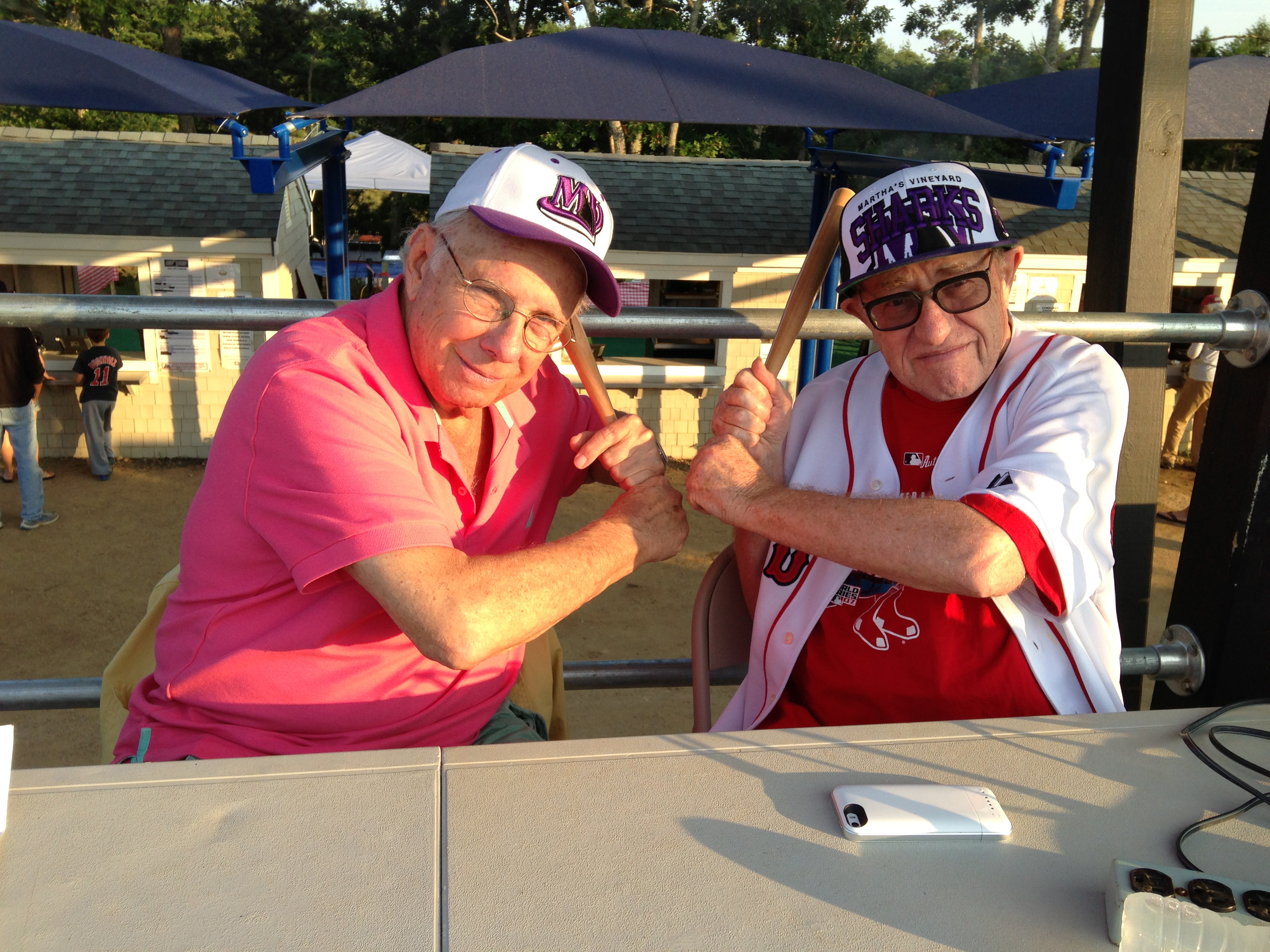 Alan Dershowitz (right) with Larry Ruttman at a Martha's Vineyard Sharks game in 2014.