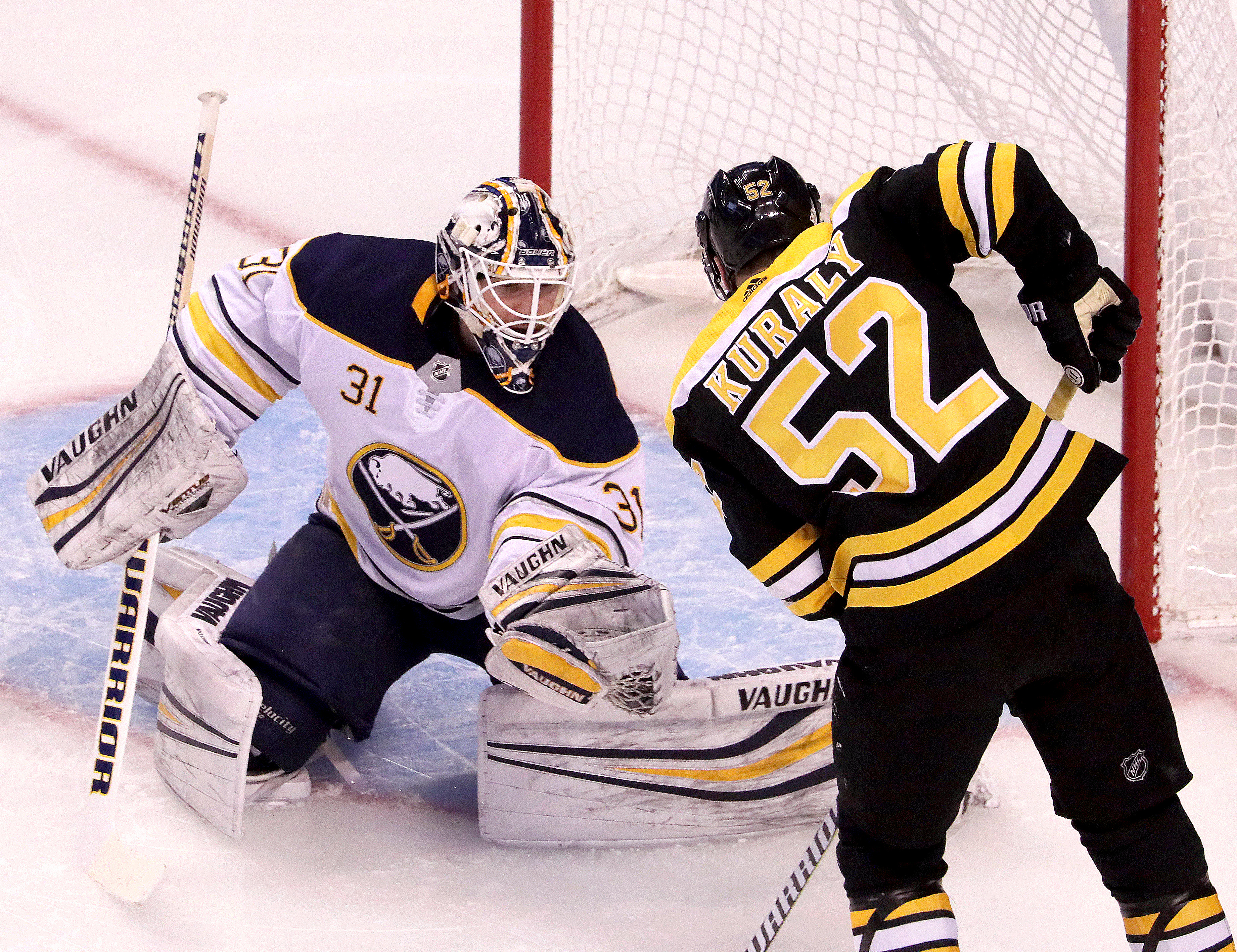 Sabres goaltender Chad Johnson gloves this shot, refusing to leaving any rebounds for Sean Kuraly in the first period.