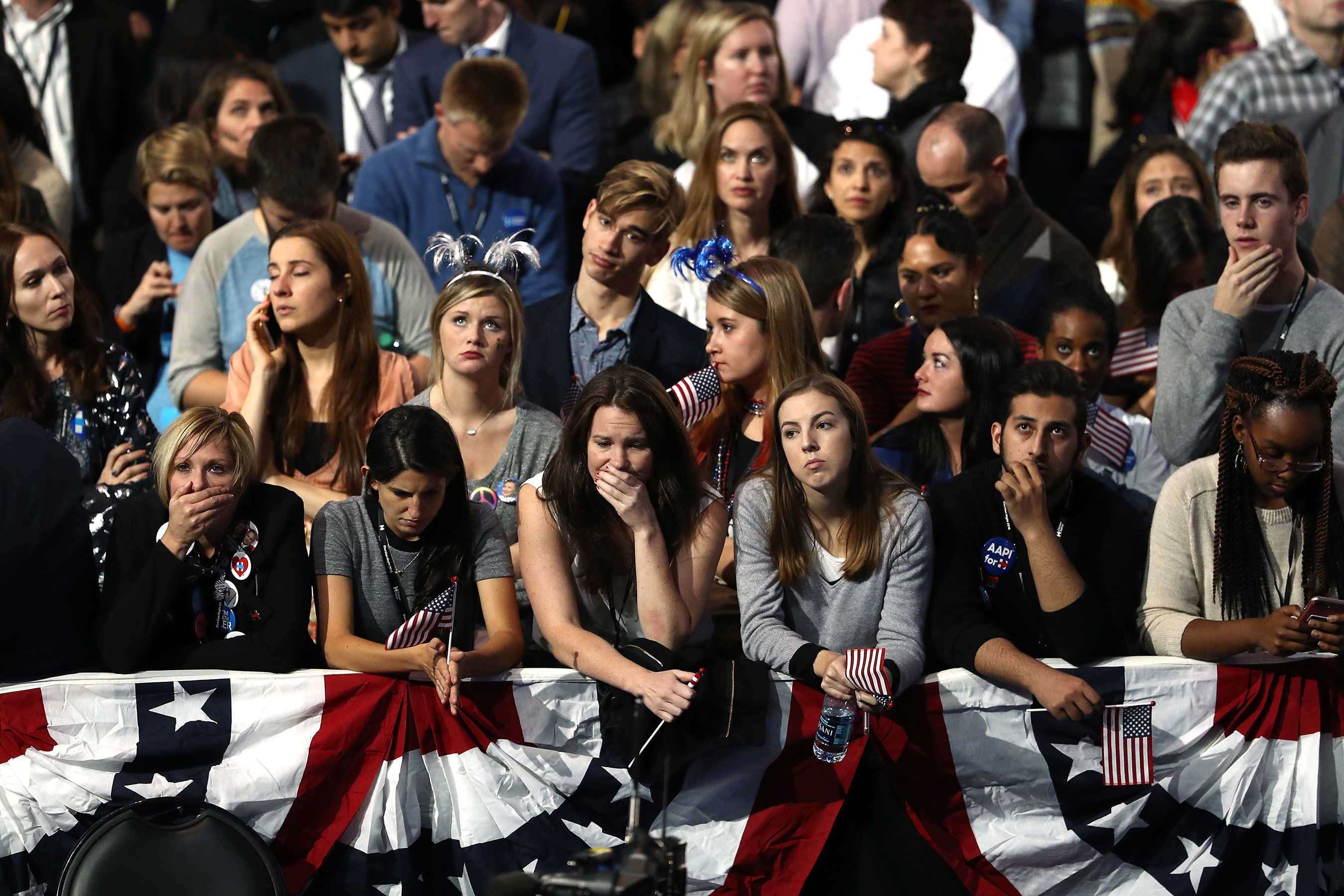 Clinton supporters at New York City’s Jacob K. Javits Convention Center react to disheartening election returns early on November 9.