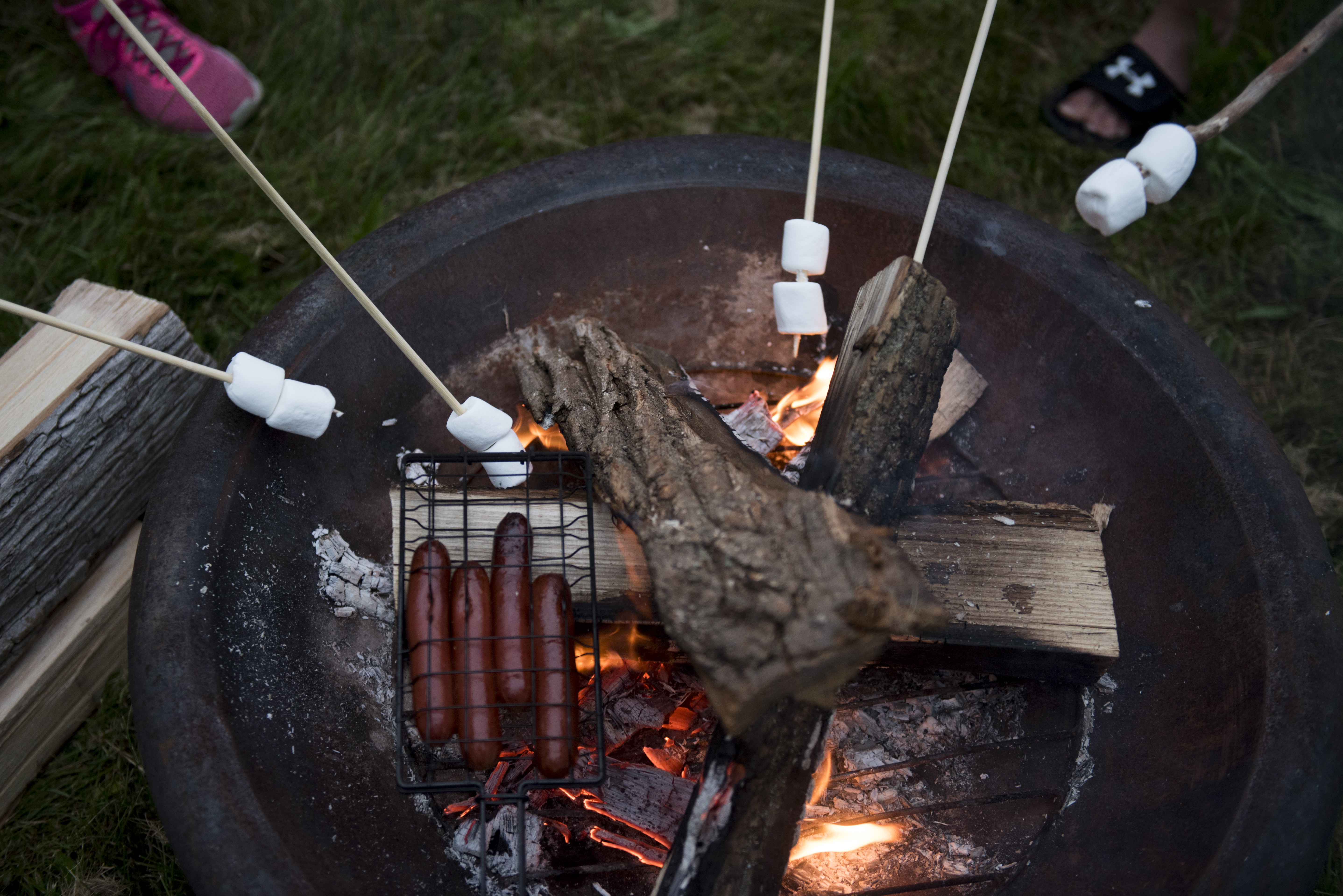 Campers roast marshmallows during the annual World End's Reservation overnight camping event.