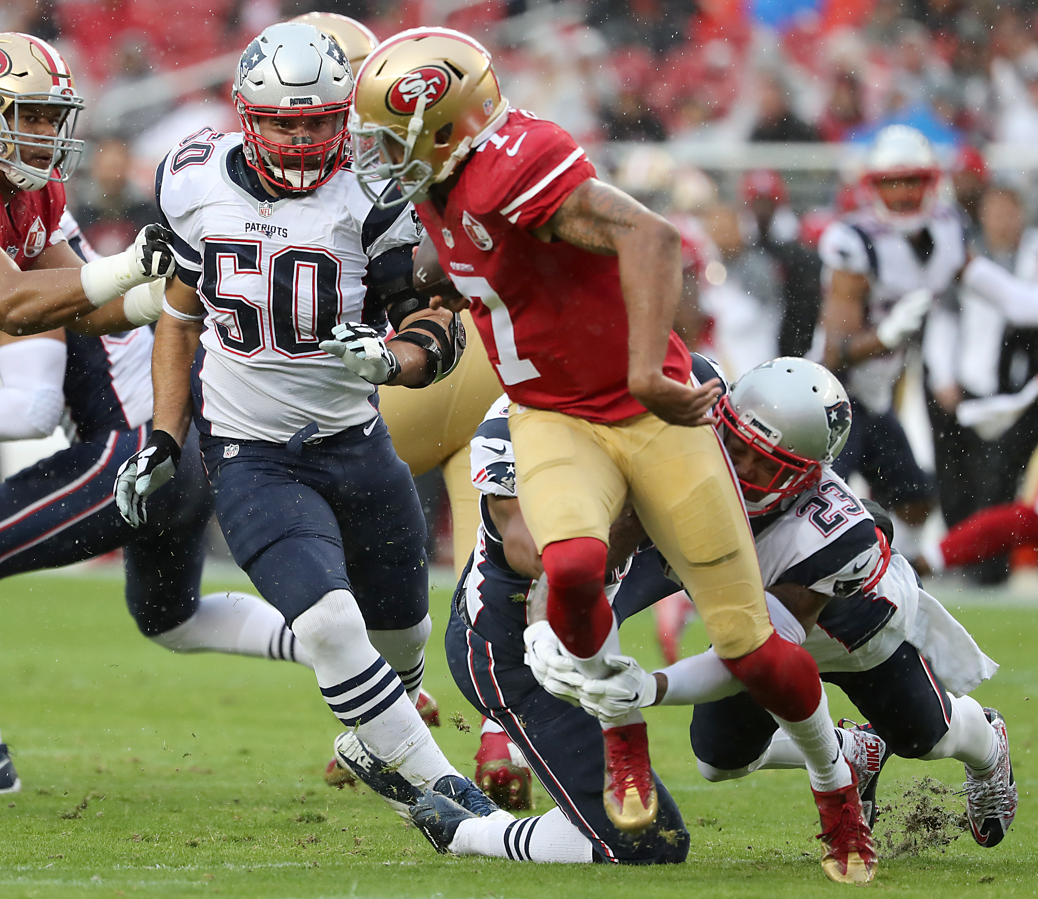 Patrick Chung and Rob Ninkovich teamed up to sack Colin Kaepernick in the first quarter.