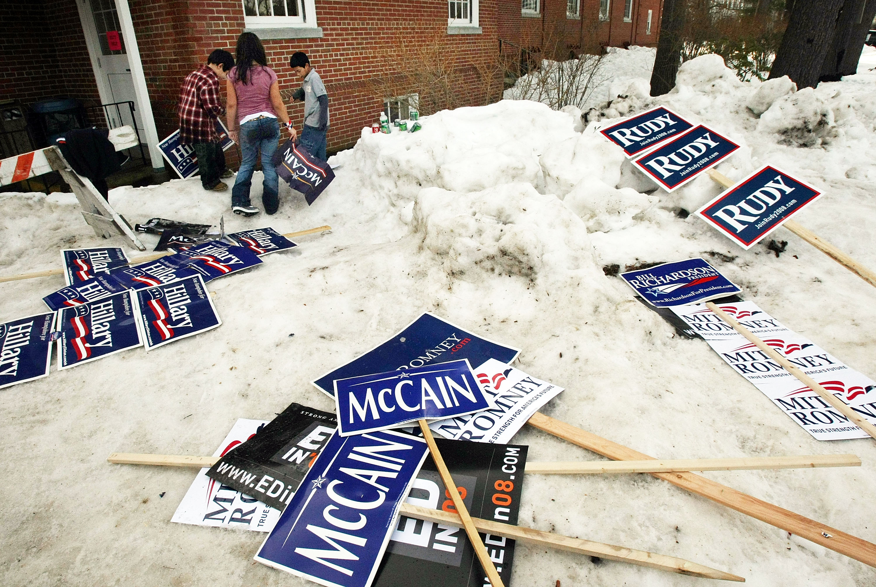 Children played with candidate signs outside a Manchester polling place in 2008.