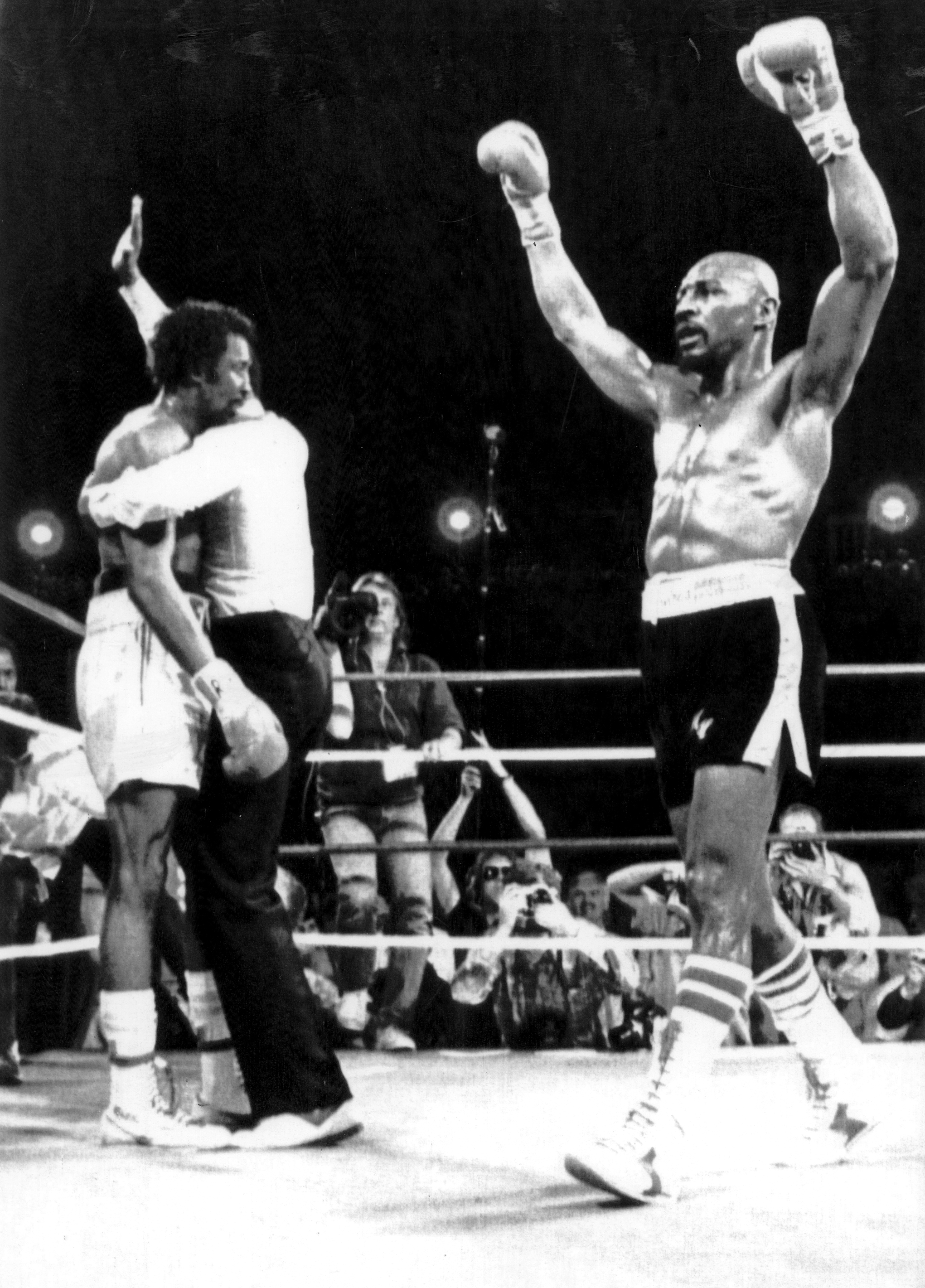 Hagler celebrated as referee Richard Steele held Hearns after stopping the fight.