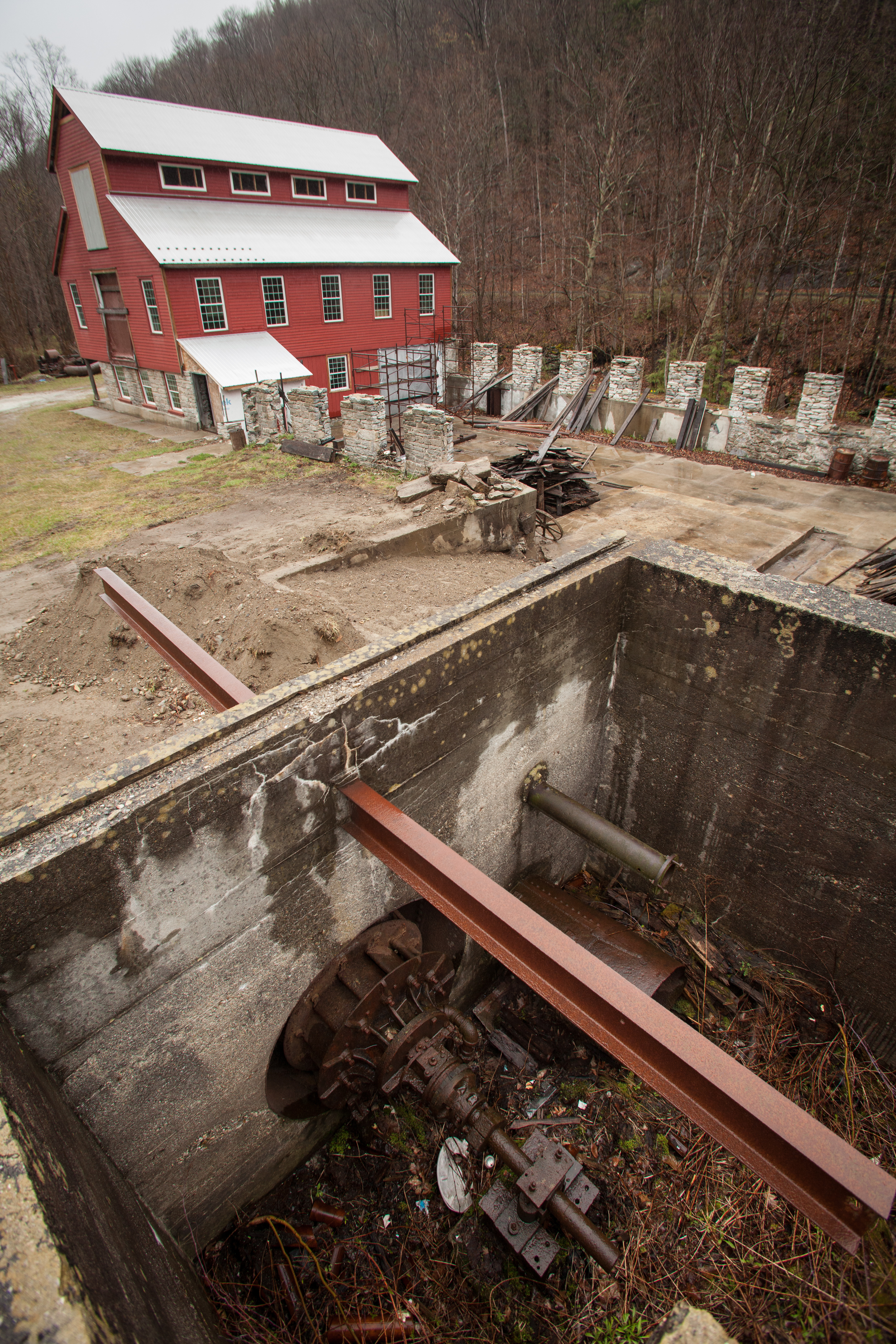 Ken Egnaczak’s property in Cheshire is the site of a former mill and small backyard dam where the Hoosic River runs.