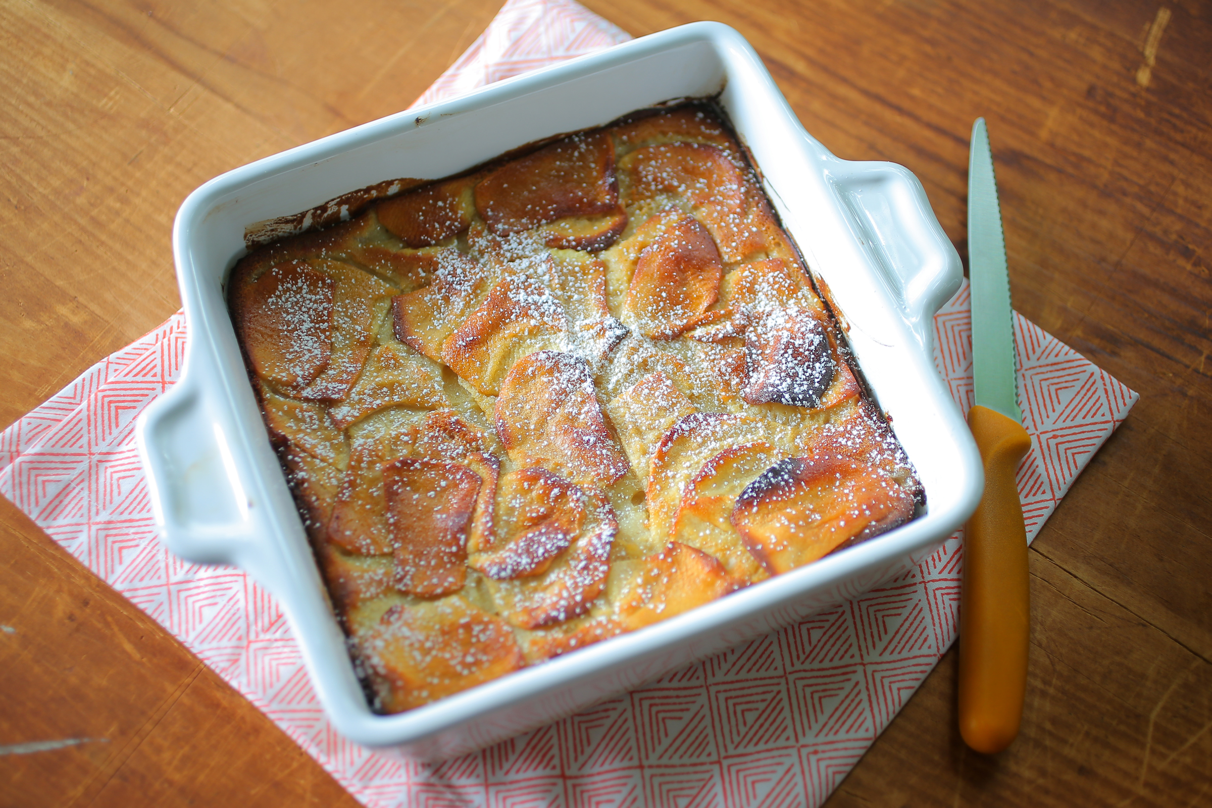 Dorie Greenspan calls her apple cake “custardy apple squares.” Sliced apples and a simple crepe batter turn into a golden, puffed, and beautiful dessert.