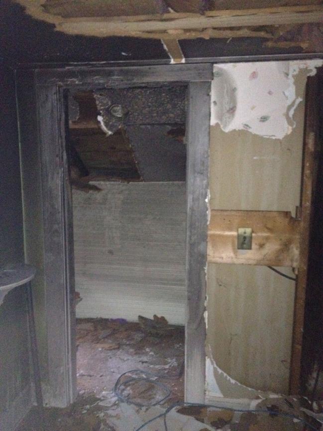 After the fire, bedroom in Matt and Vicky Robertses’ home in Essex.