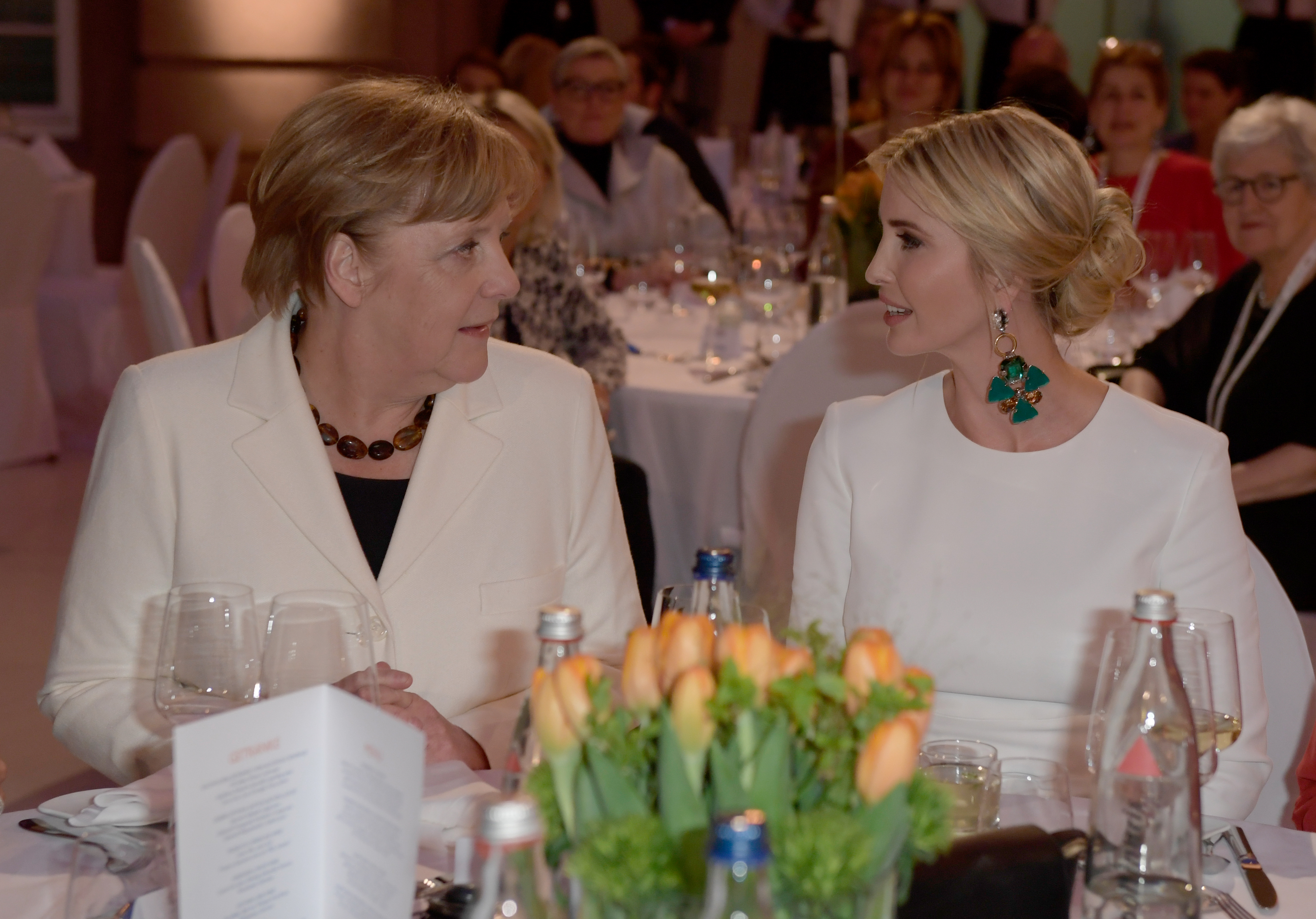 German Chancellor Angela Merkel and Ivanka Trump spoke during a dinner at the W20 summit in Berlin last week.