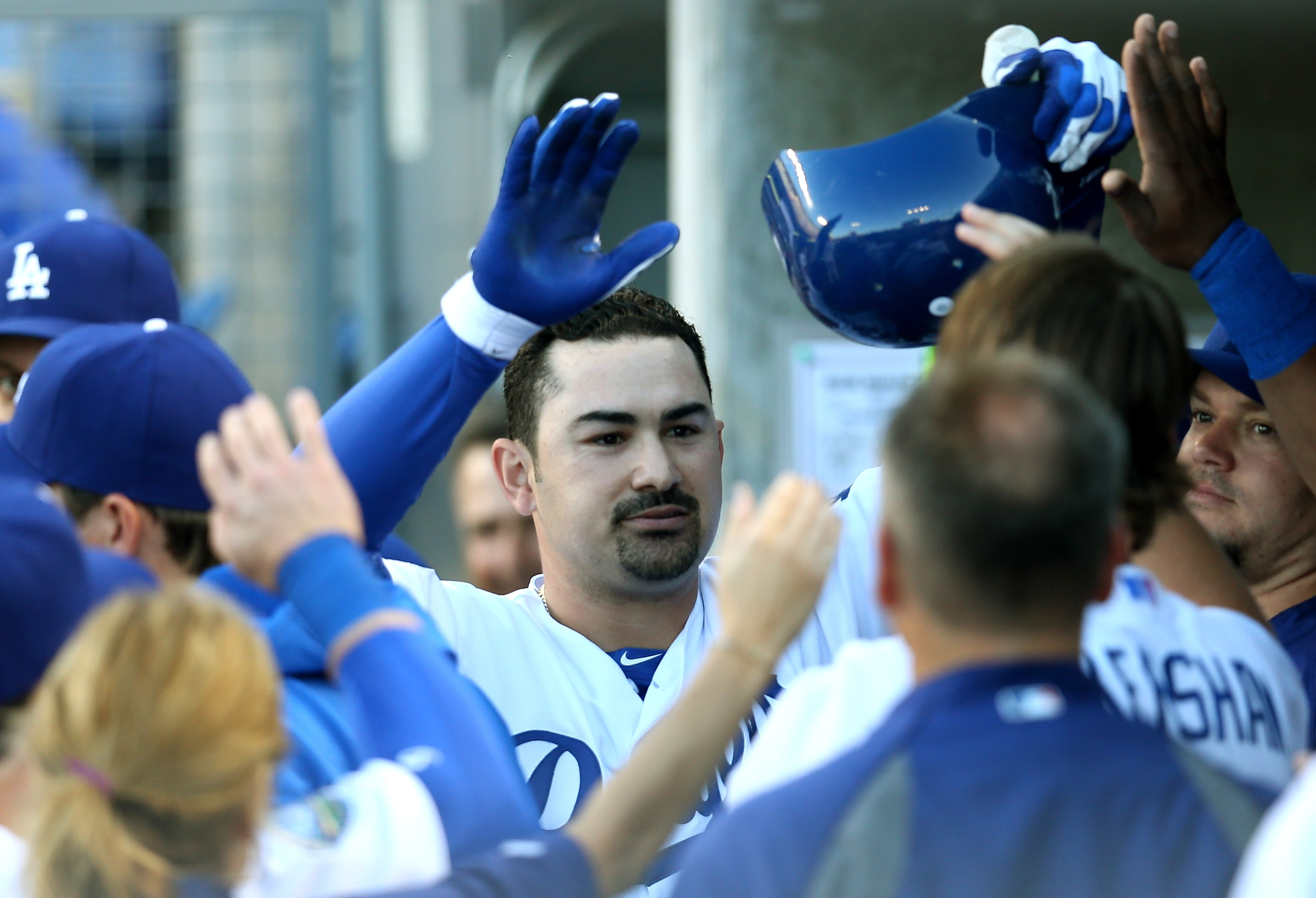 Adrian Gonzalez hit a home run in his first at-bat for the Dodgers after his trade.